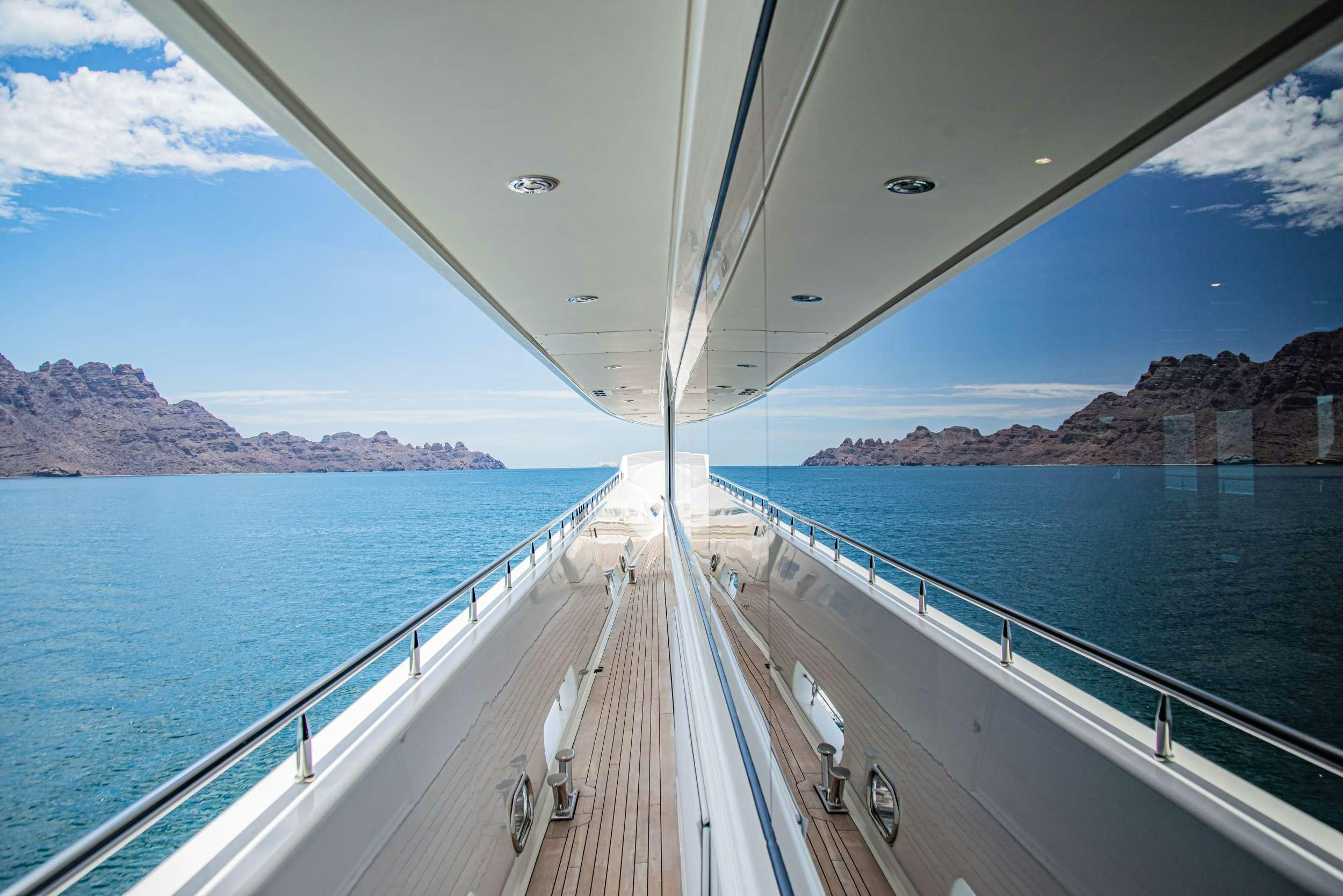 a large white bridge over water aboard RULE NO. 1 Yacht for Charter
