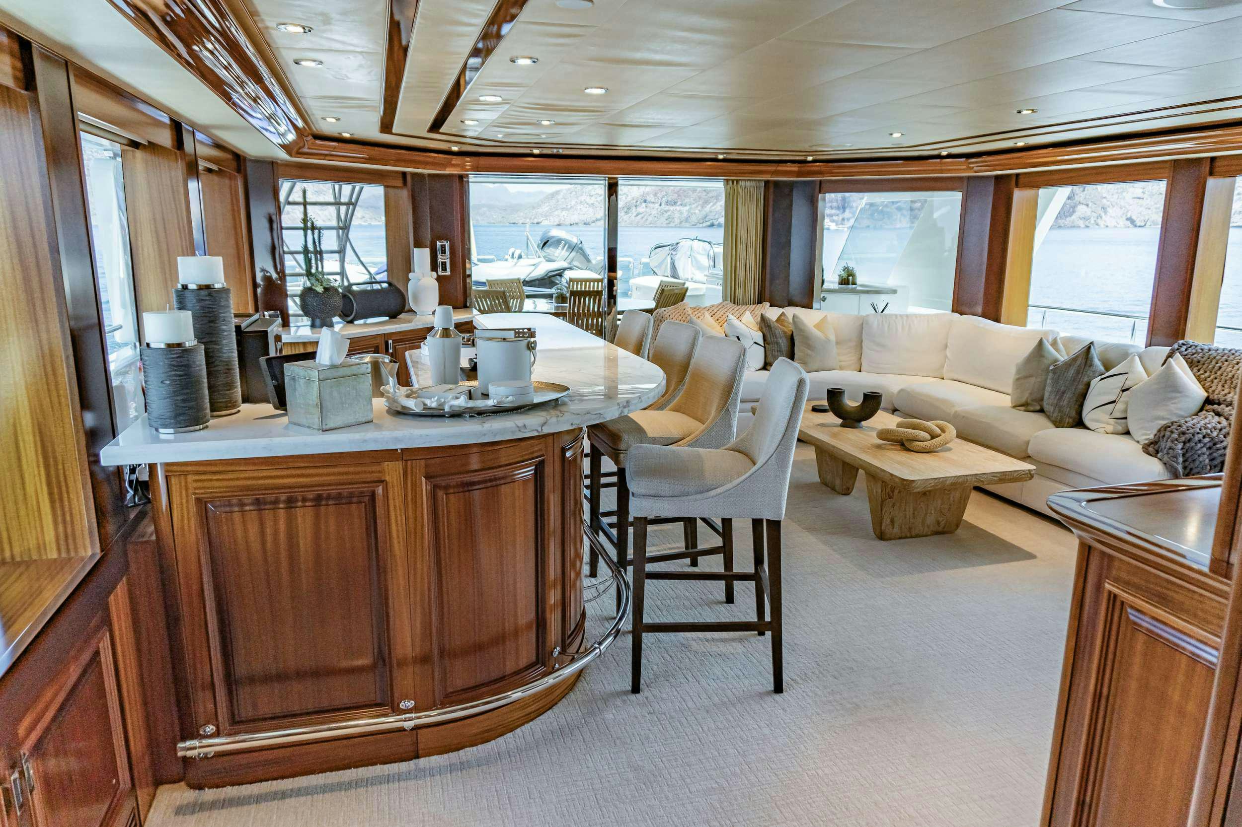 a kitchen with a table and chairs aboard RULE NO. 1 Yacht for Charter