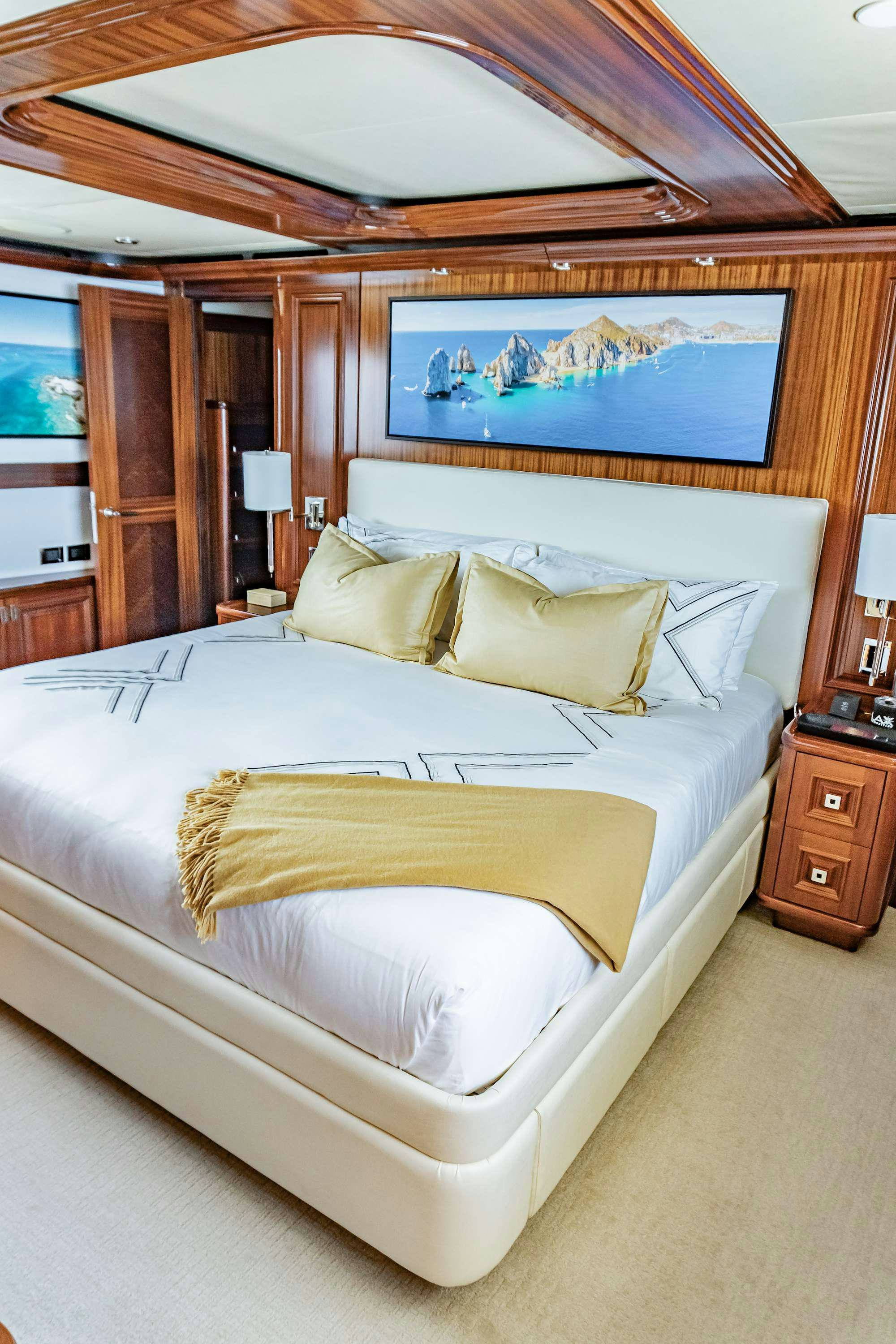 a bed with a canopy over it aboard RULE NO. 1 Yacht for Charter