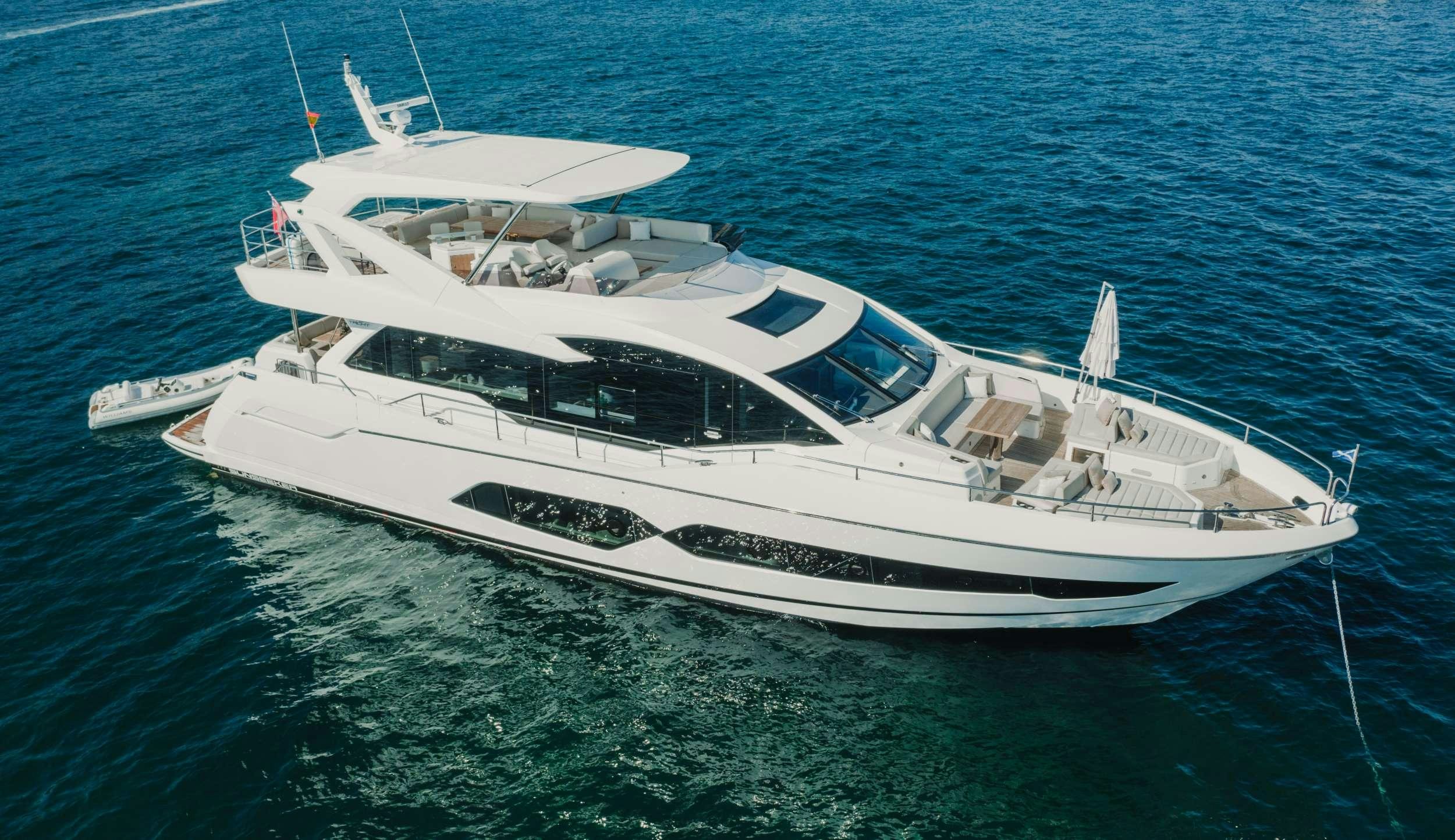 a white yacht in the water aboard LADY M Yacht for Charter