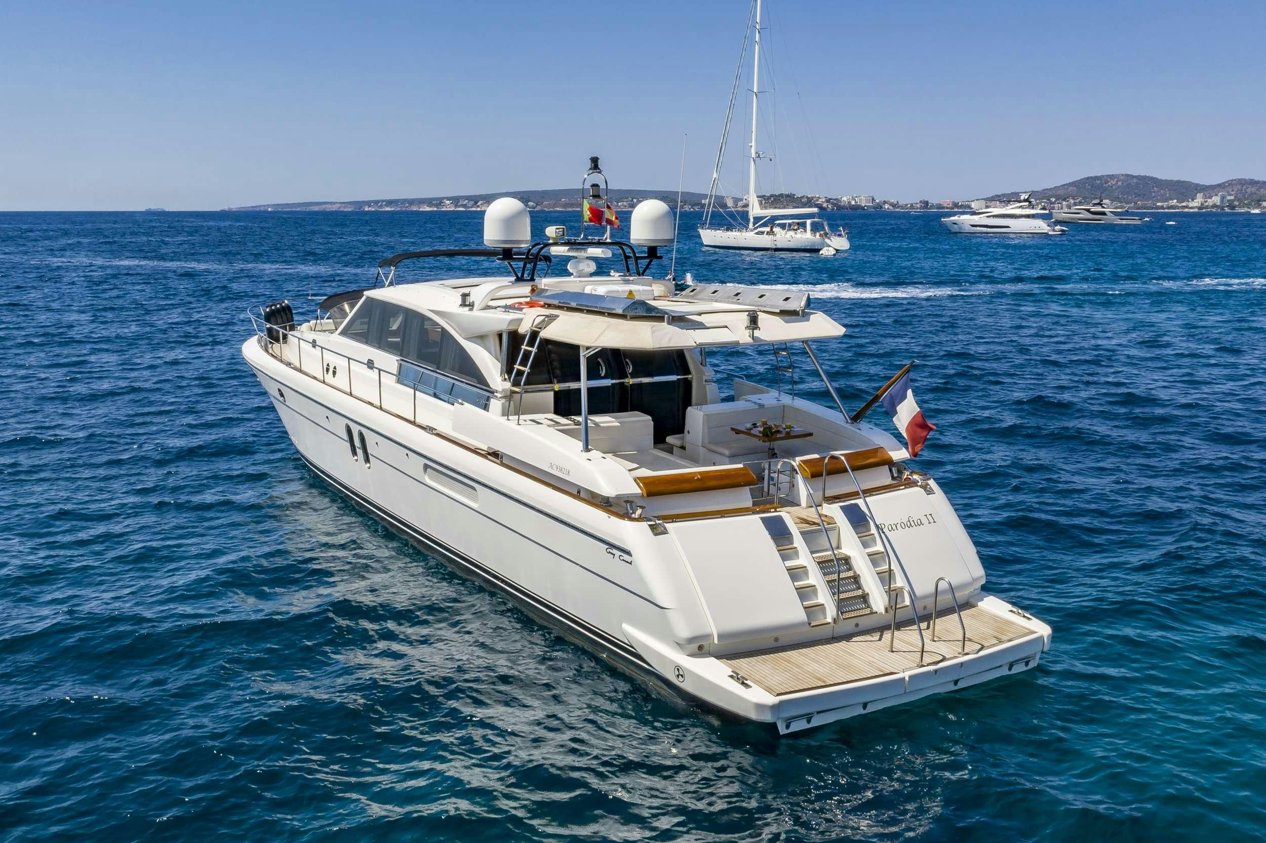 a white boat in the water aboard PARODIA Yacht for Charter