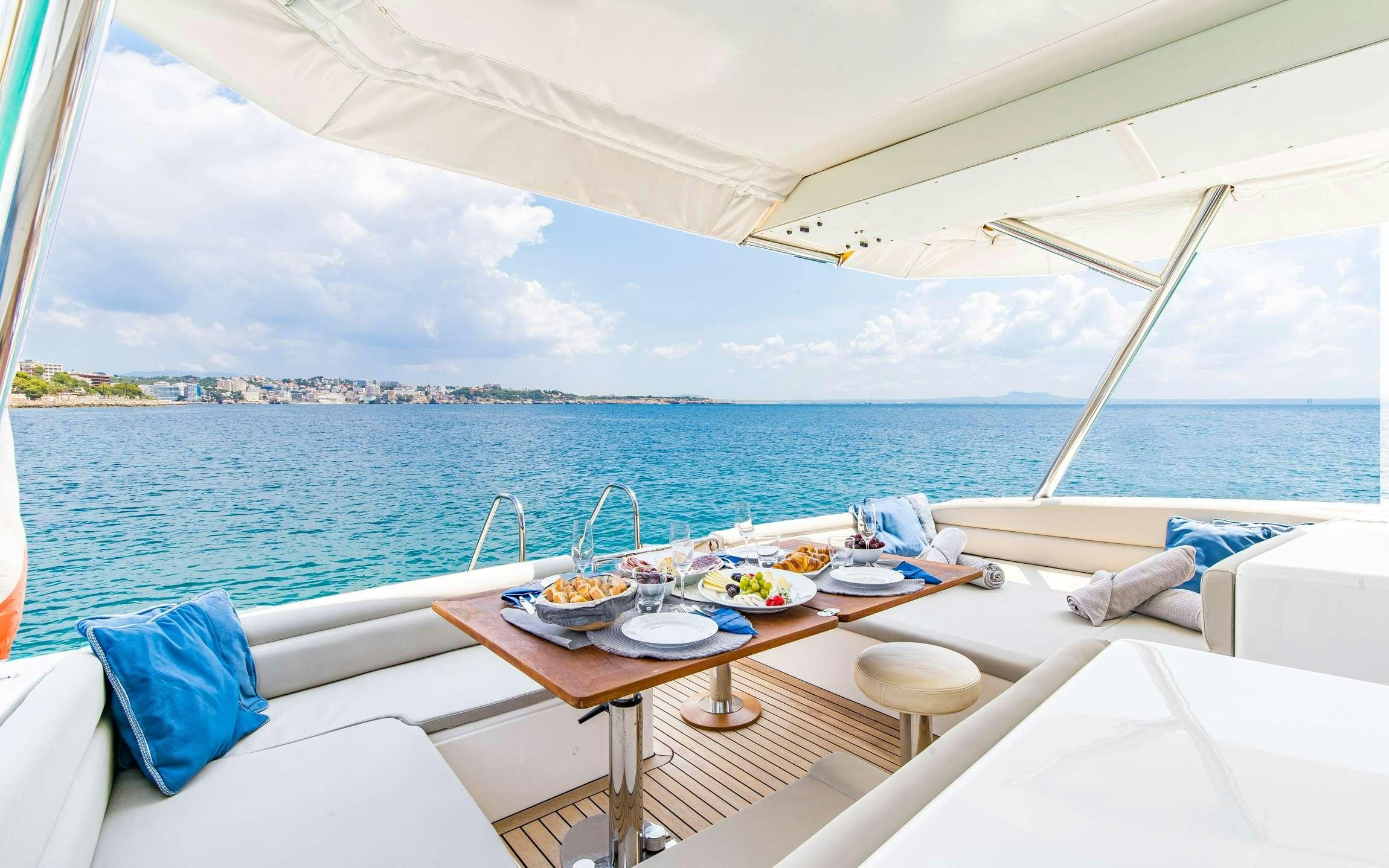 a table with food on it aboard PARODIA Yacht for Charter