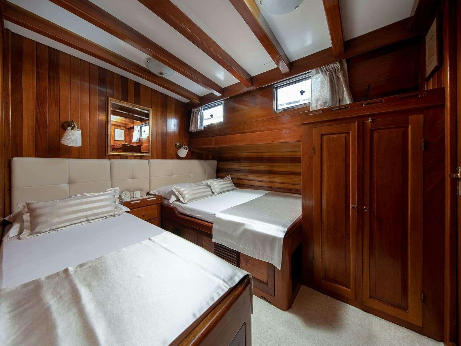 a room with two beds aboard GULET ANDI STAR Yacht for Charter