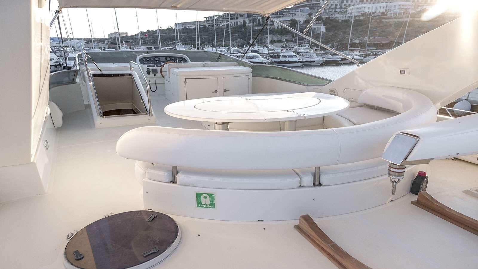 a room with a large white tank aboard TITAN Yacht for Charter