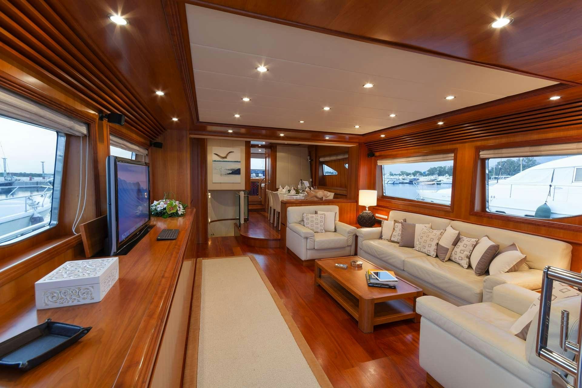 a living room with a wood ceiling aboard ALFEA Yacht for Charter
