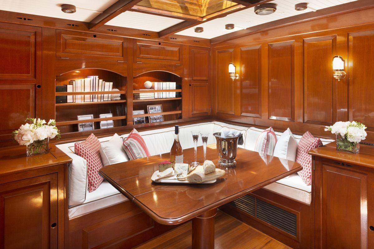 a large wooden kitchen with wooden cabinets aboard NORTHERN STAR Yacht for Charter