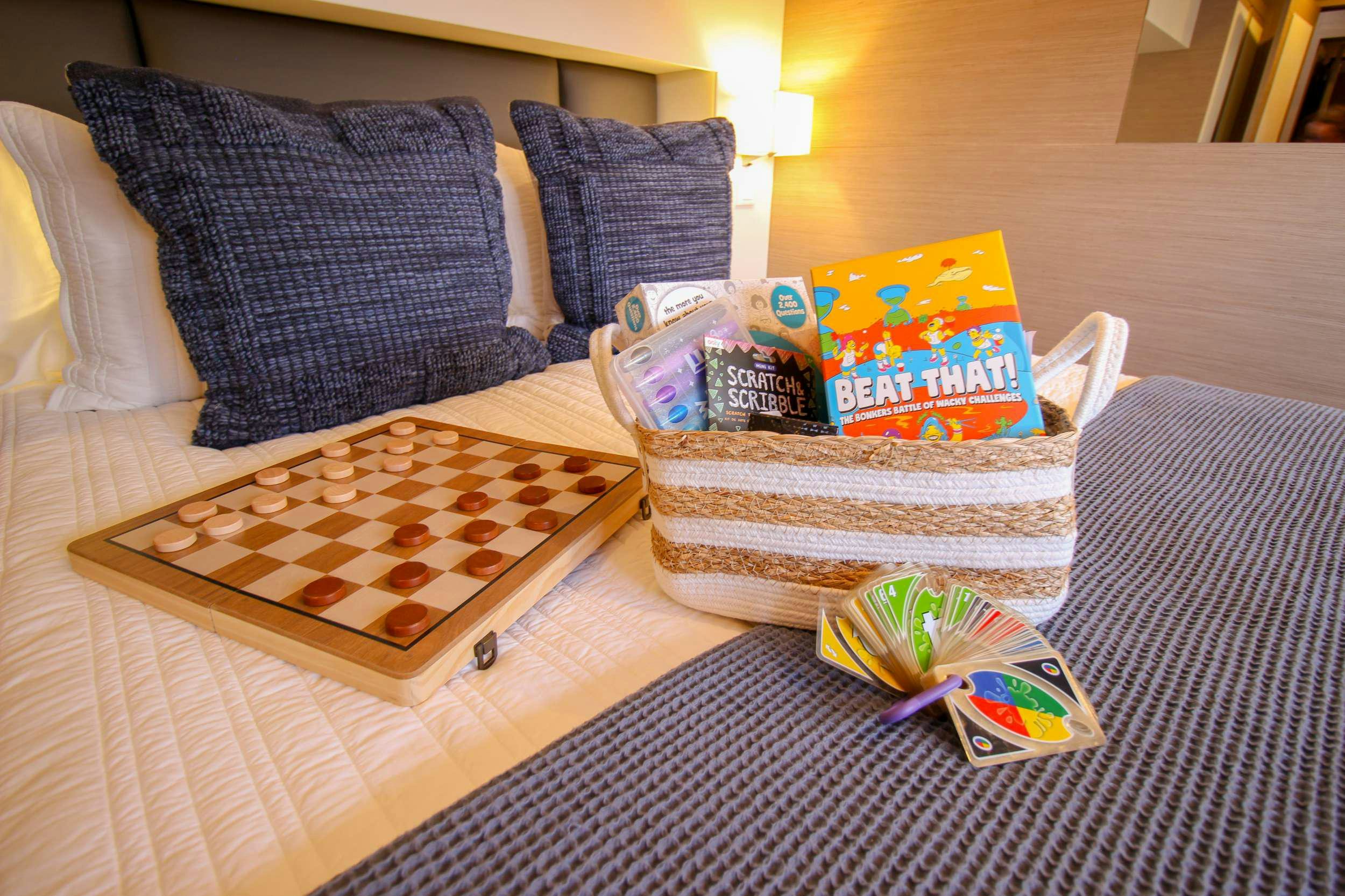 a couple of boxes on a bed aboard PRINCESS MILA Yacht for Charter