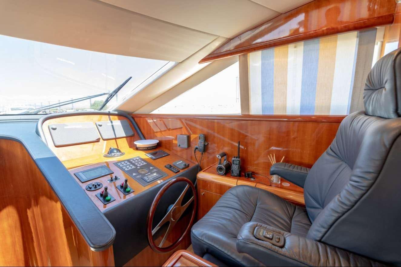 a room with a desk and a laptop on it aboard VENUS SECRETS Yacht for Charter
