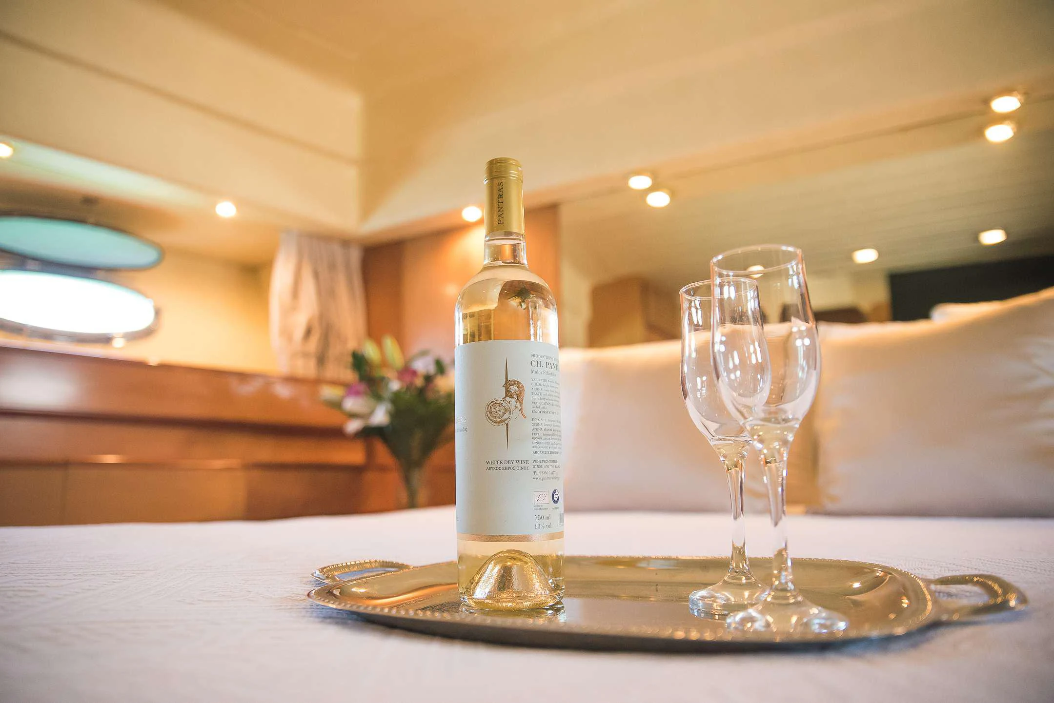 a bottle of liquor on a table aboard TEMPTATION Yacht for Charter