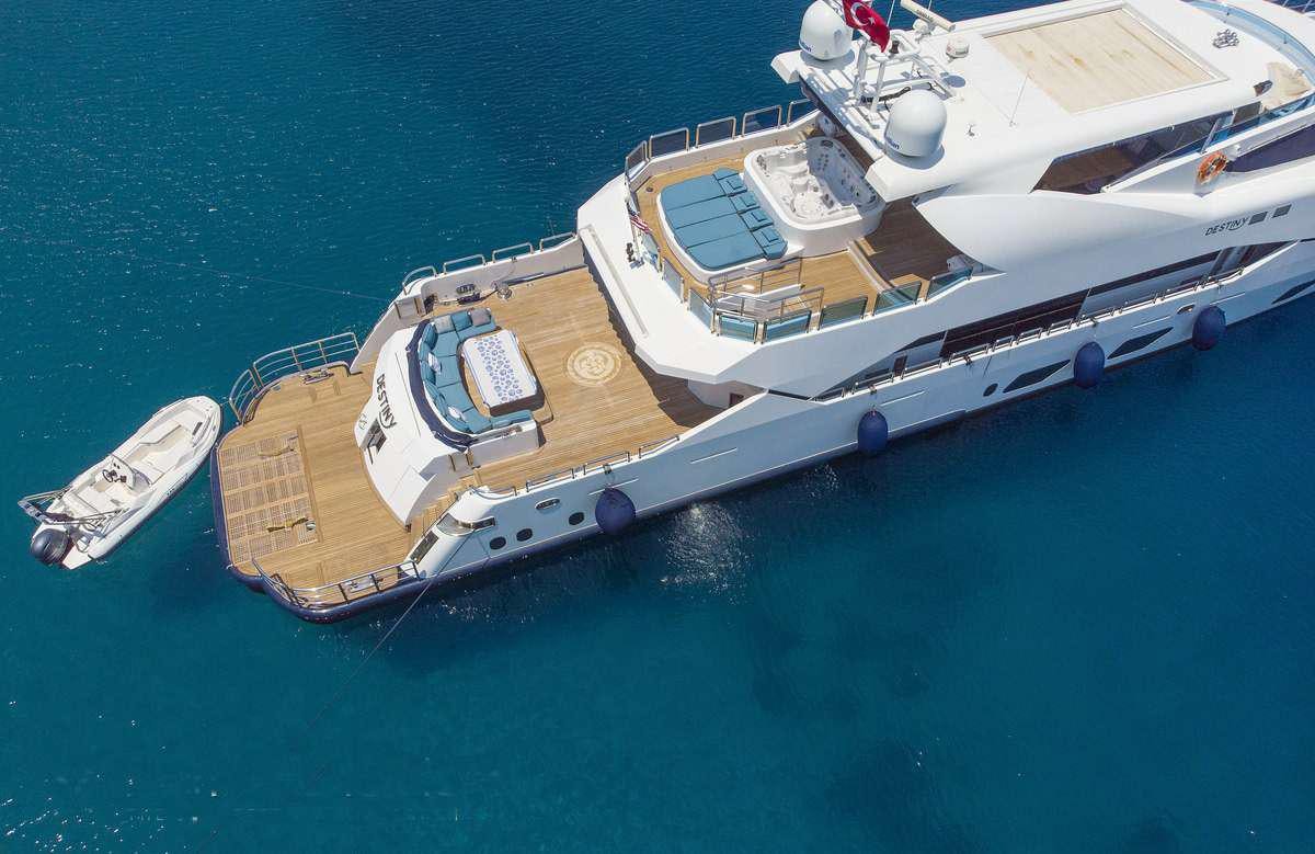 a group of boats in the water aboard DESTINY Yacht for Charter