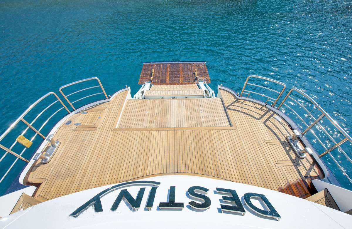 a large boat on the water aboard DESTINY Yacht for Charter