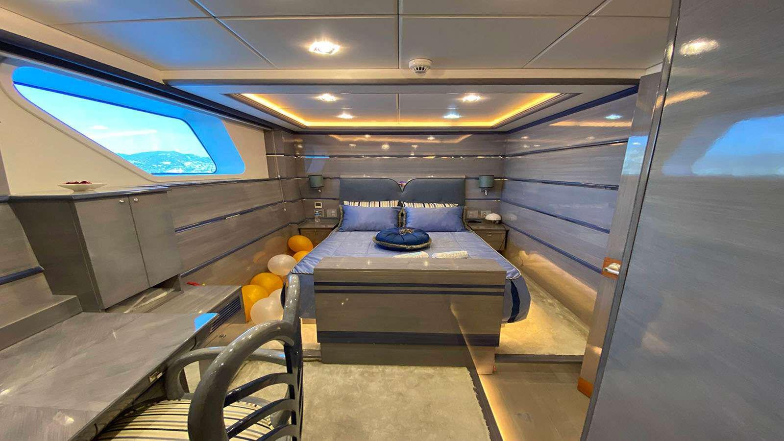 a room with a table and chairs aboard DESTINY Yacht for Charter