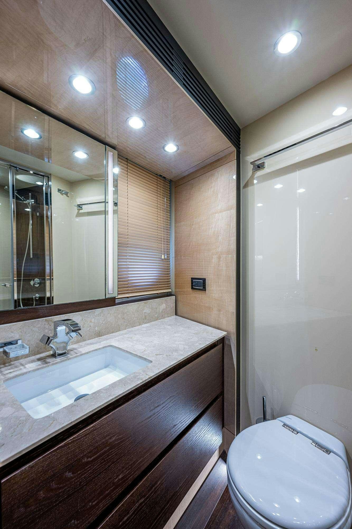 a bathroom with a sink and a toilet aboard STAYSEA Yacht for Charter