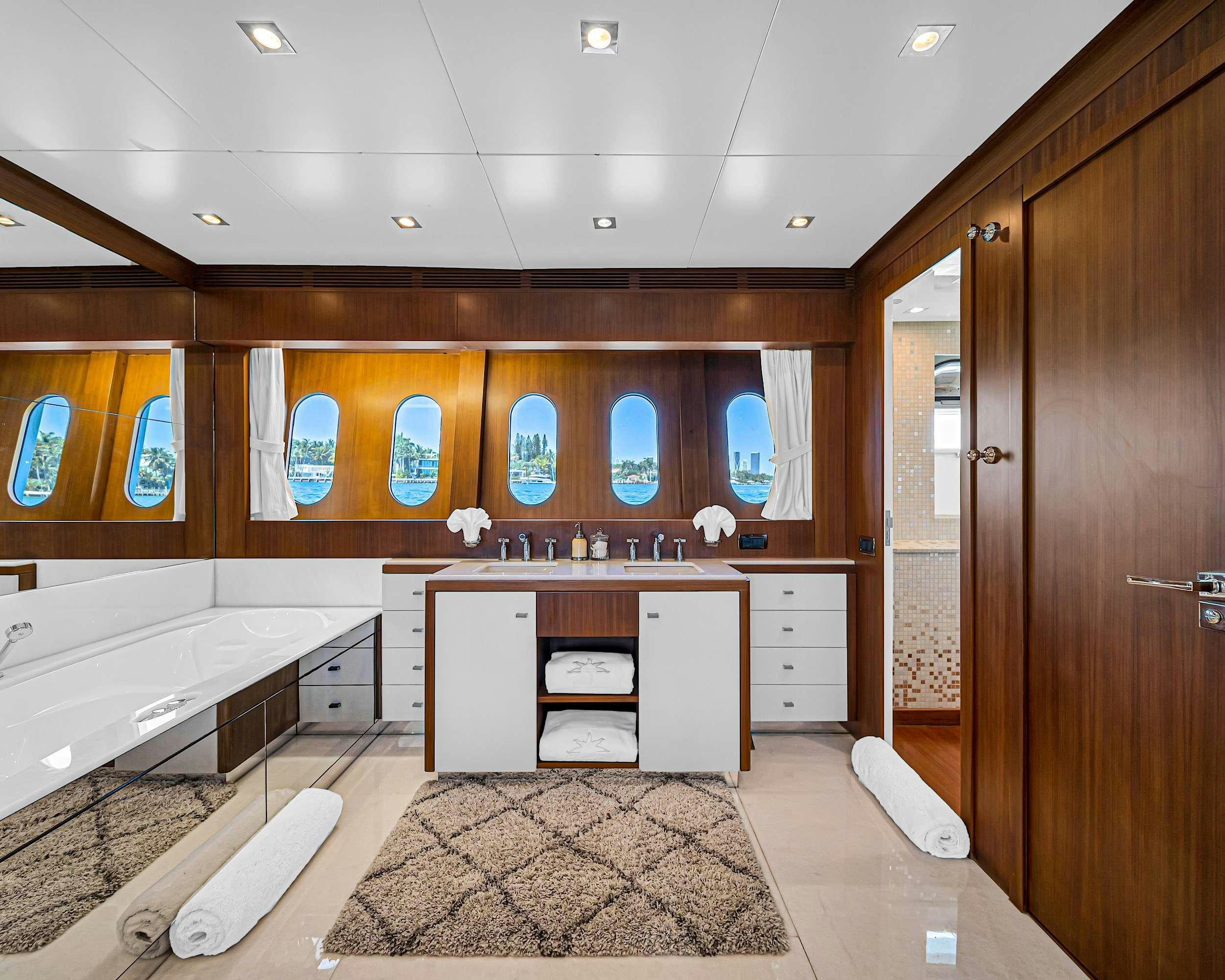 a bathroom with a large tub aboard CARPE DIEM Yacht for Charter