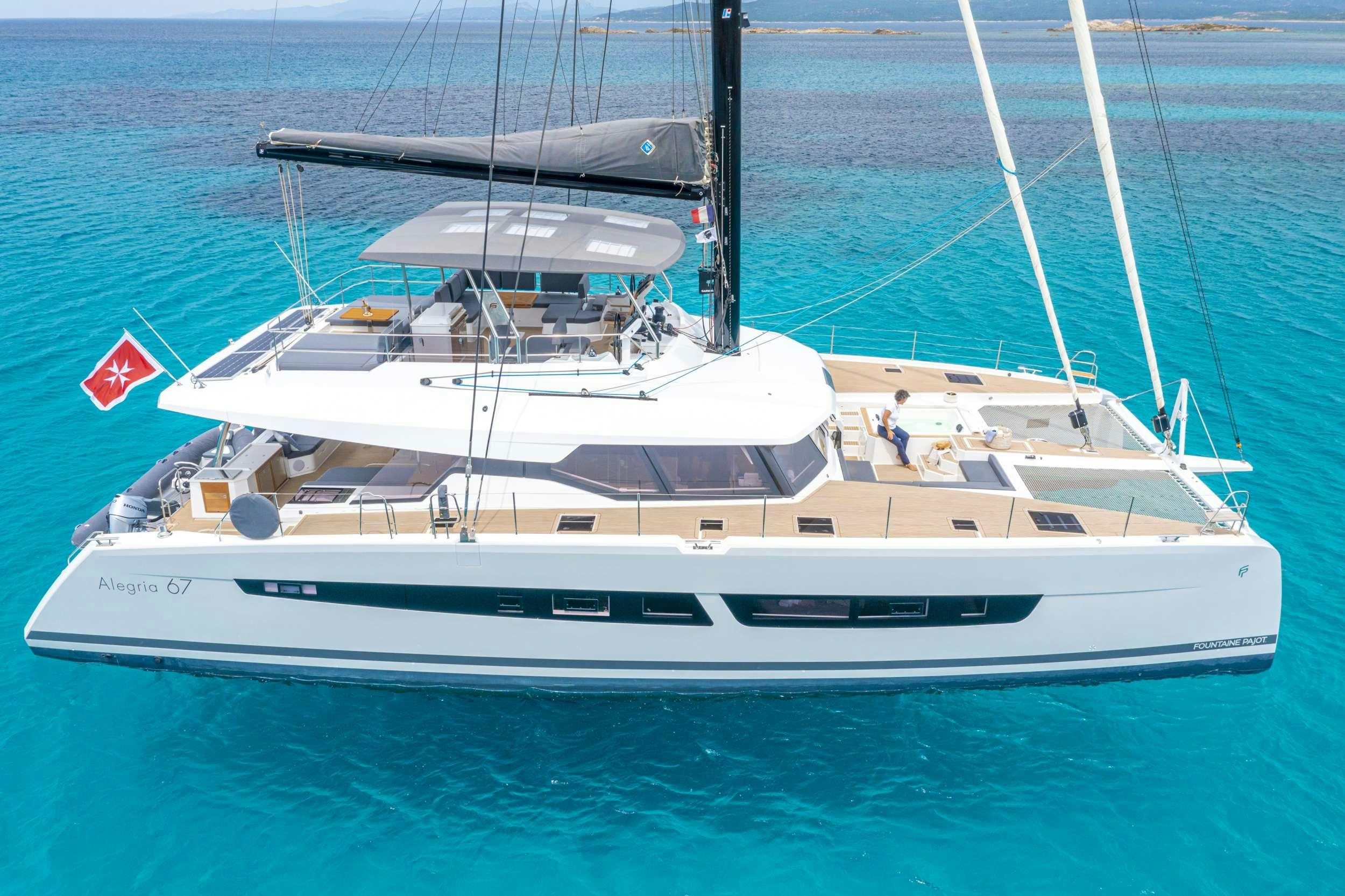 a white yacht on the water aboard SEMPER FIDELIS Yacht for Charter