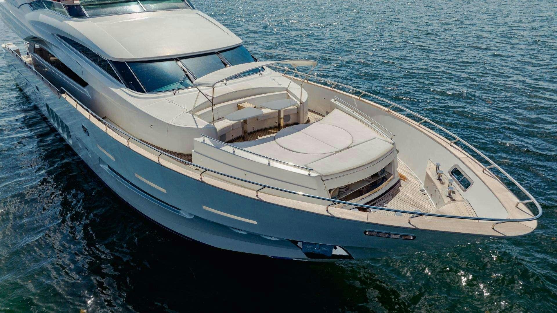 a white boat on the water aboard 95 DOMINATOR Yacht for Charter