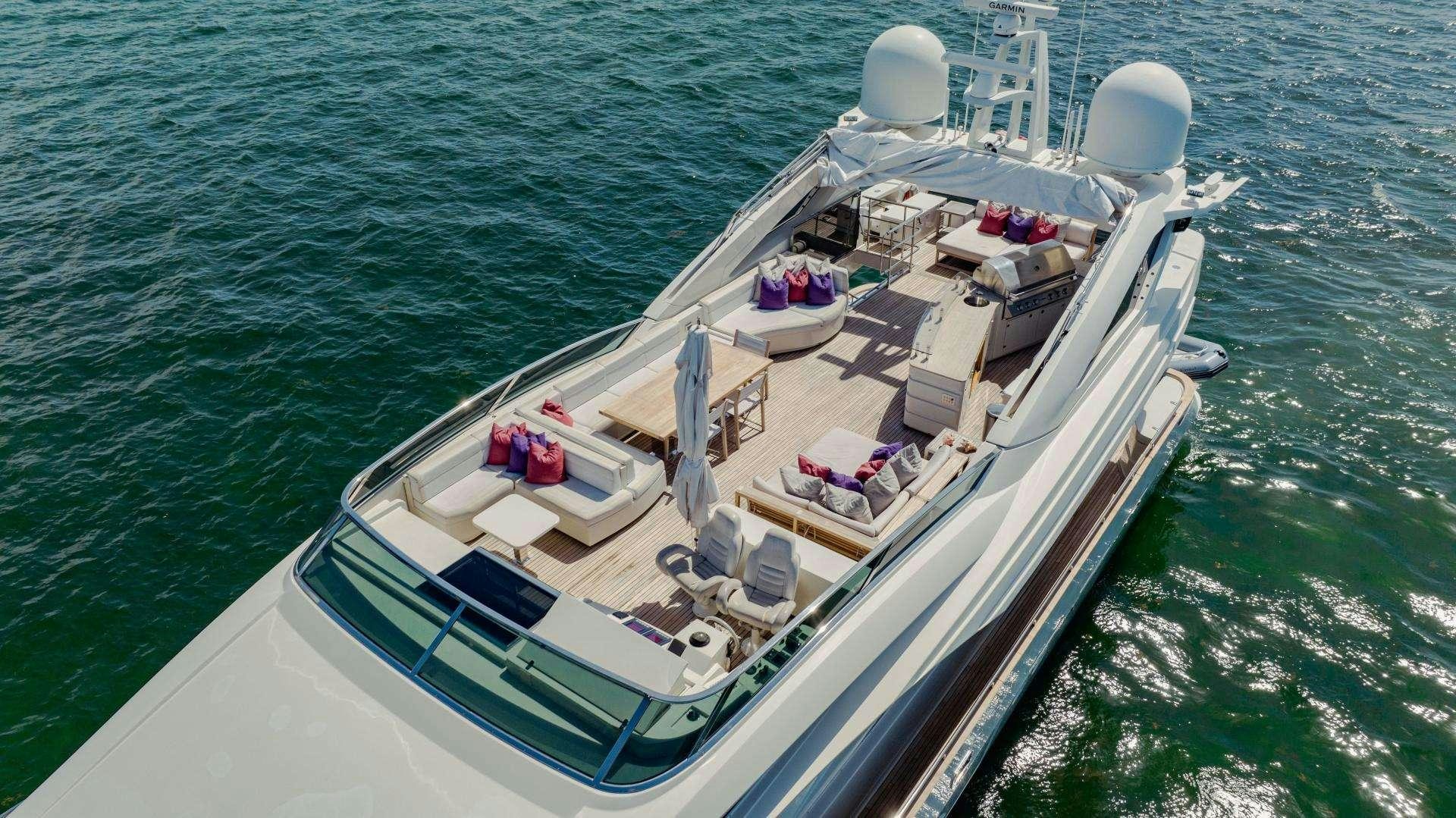 a large white boat with many items on it aboard 95 DOMINATOR Yacht for Charter
