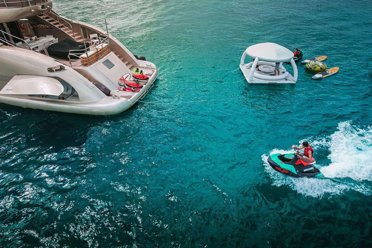 a group of boats in the water aboard YCM 120 Yacht for Charter