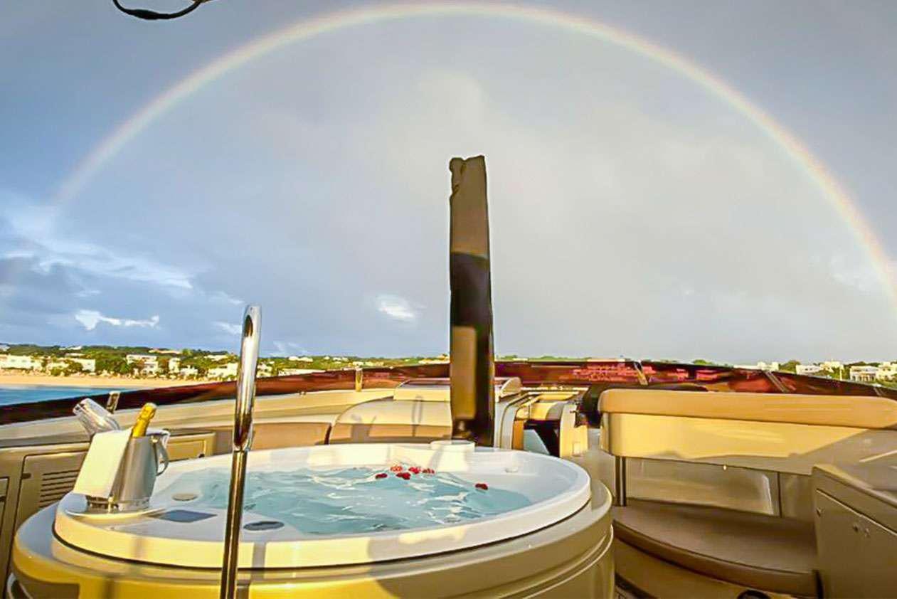 a view of a city from a boat aboard YCM 120 Yacht for Charter