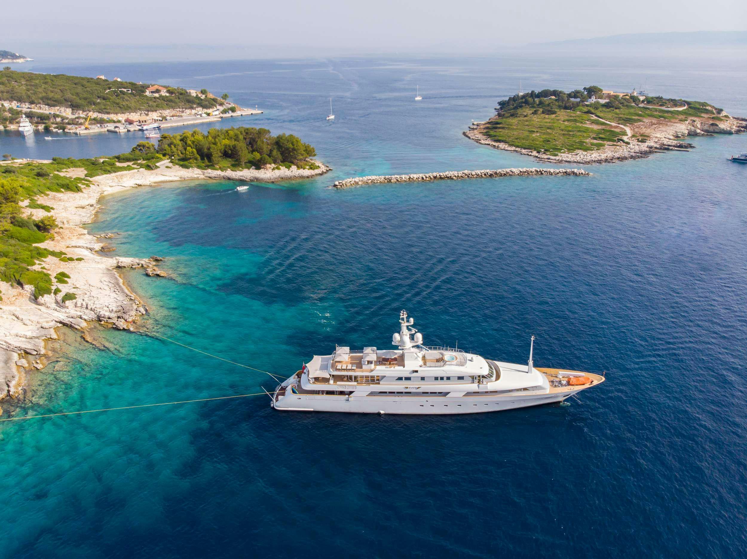 a boat sailing on the water aboard ISABELL Yacht for Charter