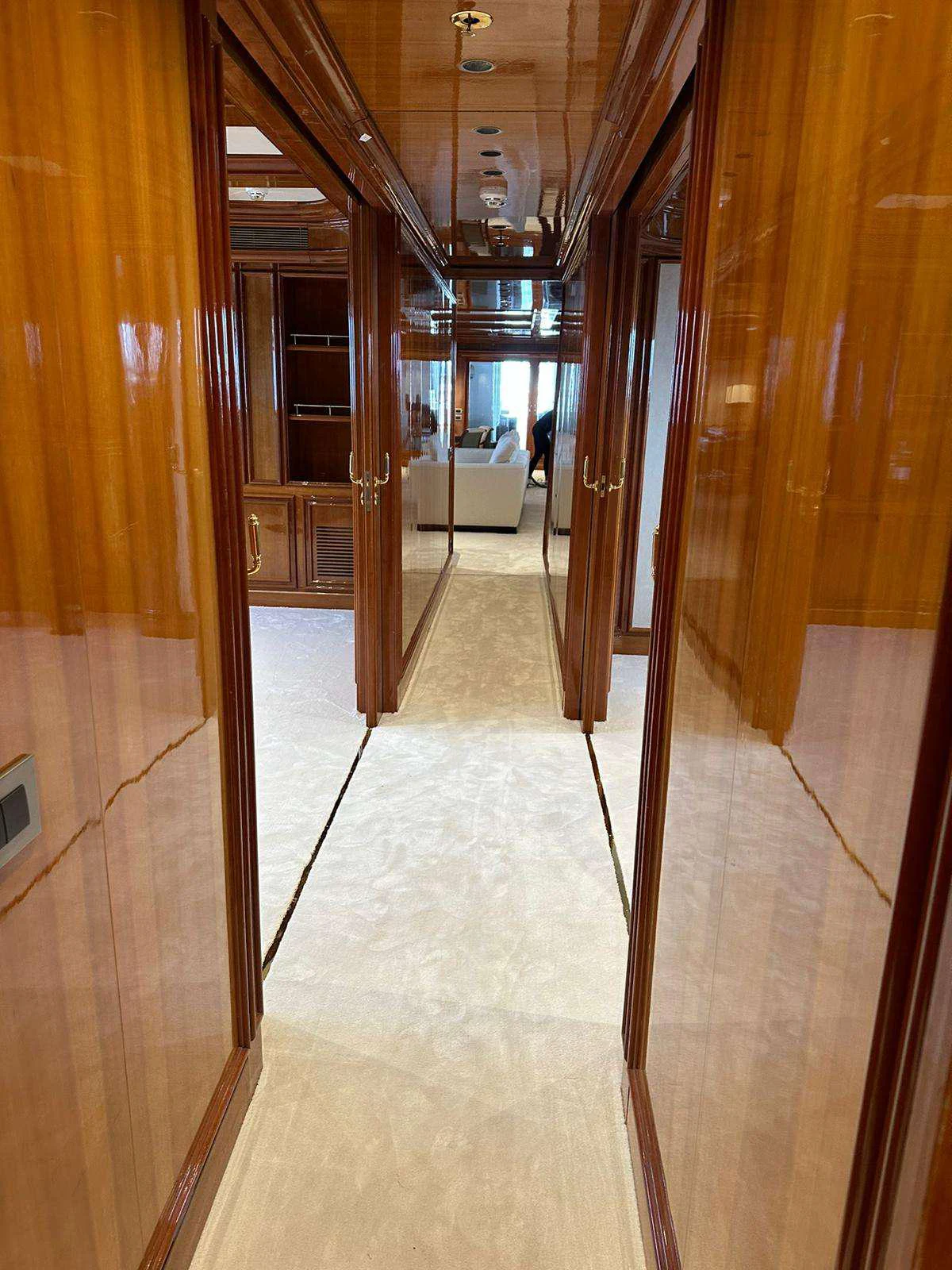 a hallway with a glass door aboard ISABELL PRINCESS OF THE SEA Yacht for Charter