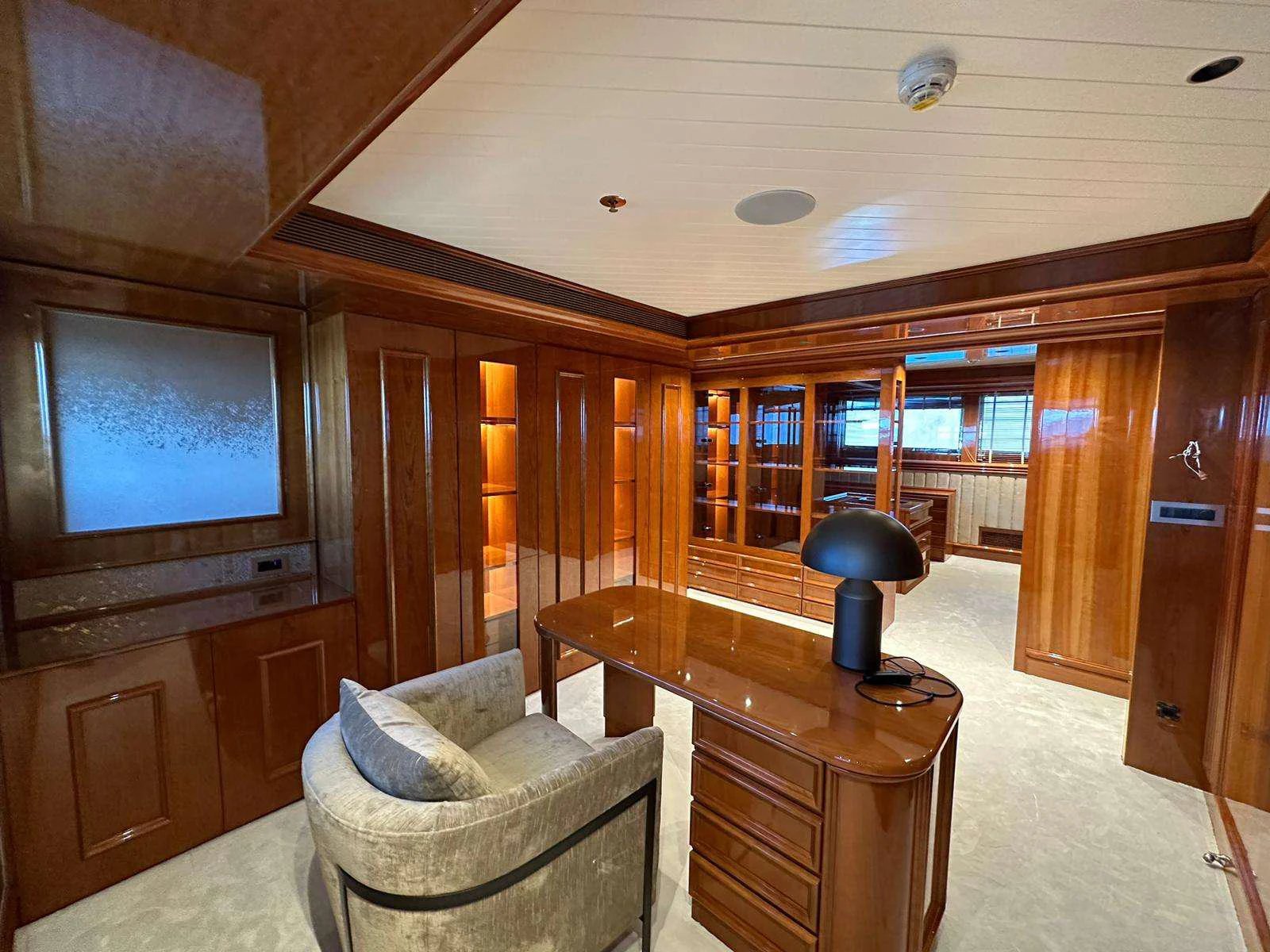 a room with a television and a table aboard ISABELL PRINCESS OF THE SEA Yacht for Charter