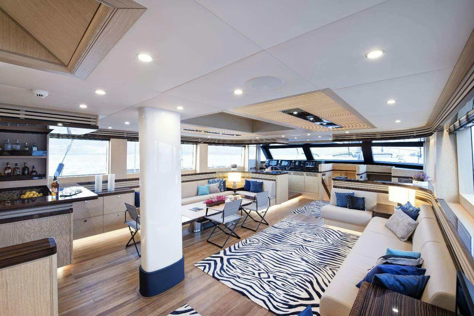 a large modern kitchen with a large open window aboard THAT'S AMORE Yacht for Charter