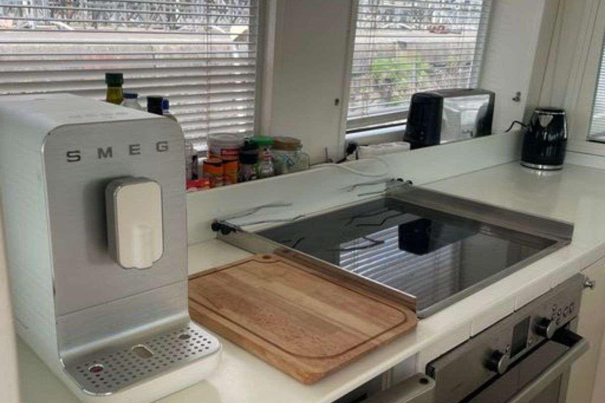 a white machine on a counter aboard FLAMENGA Yacht for Charter