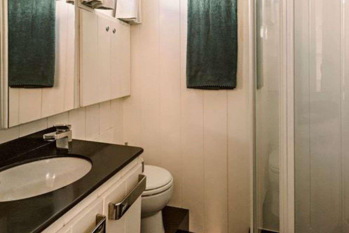 a bathroom with a sink and toilet aboard FLAMENGA Yacht for Charter