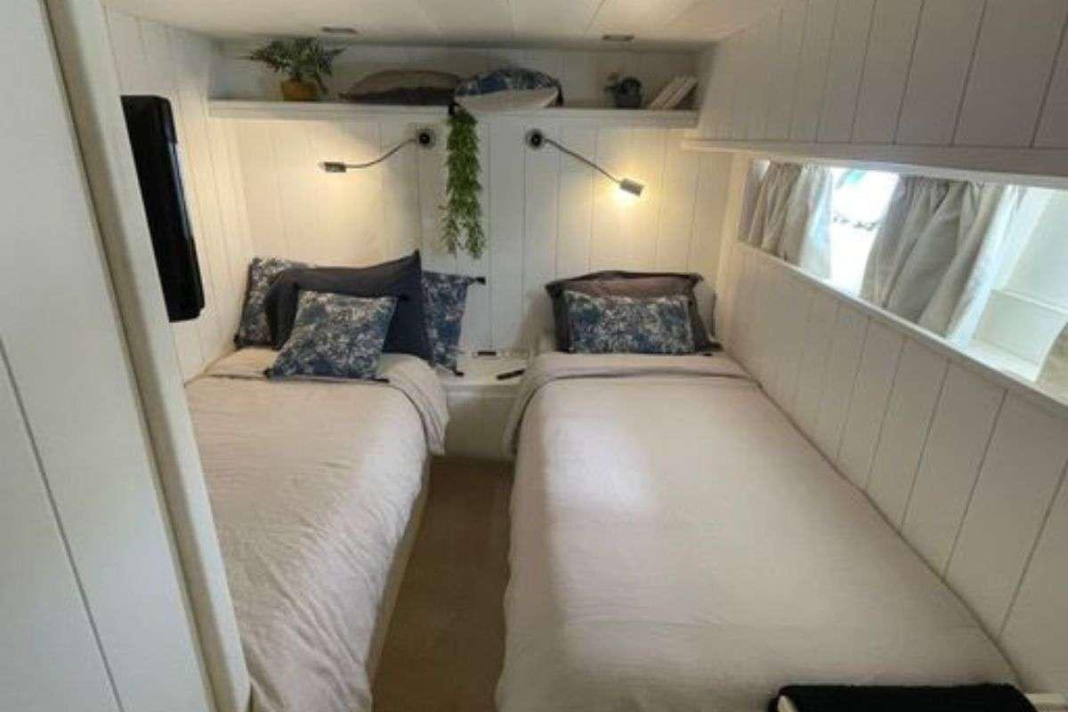 a room with two beds aboard FLAMENGA Yacht for Charter