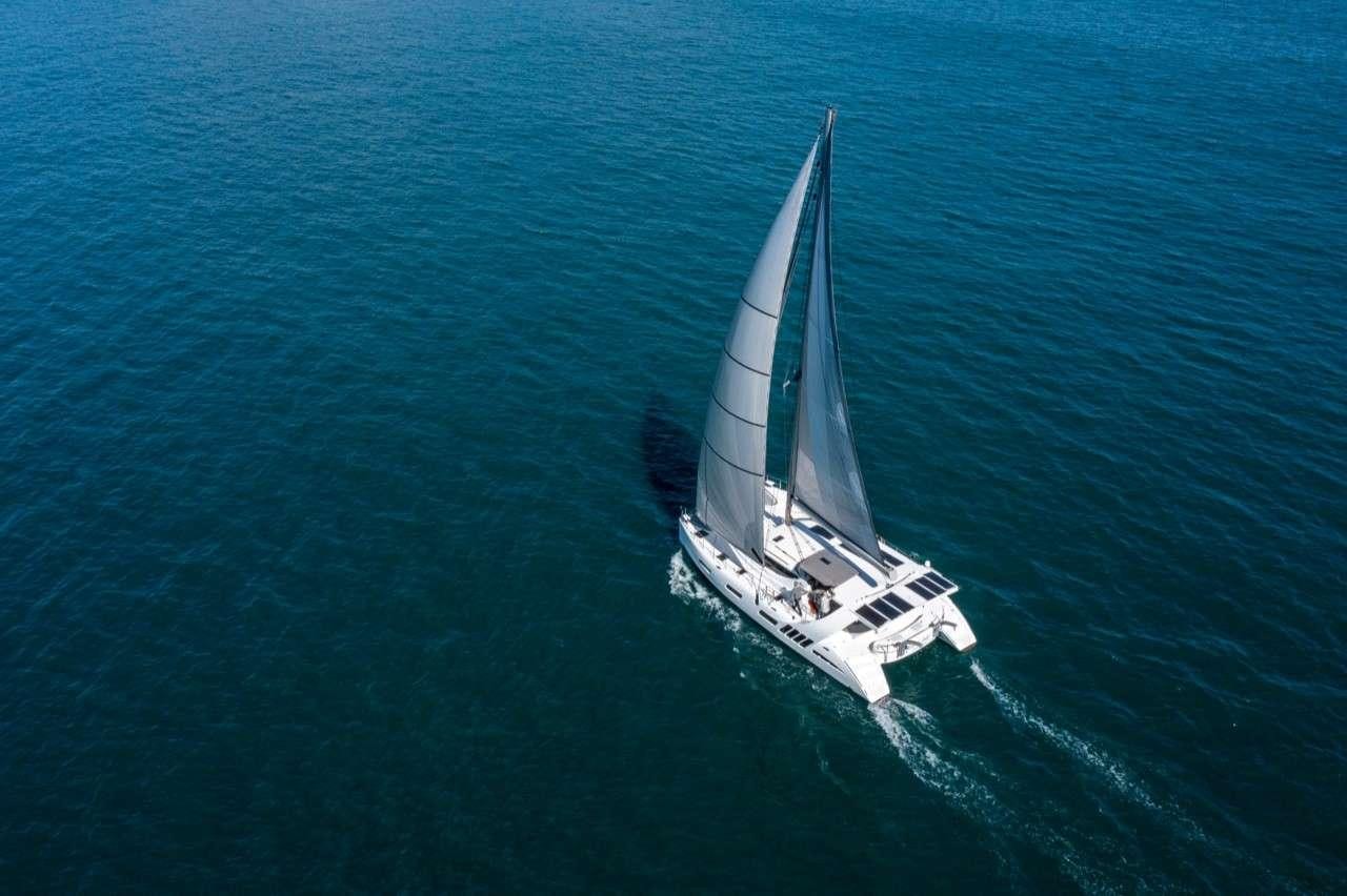 a boat sailing on the sea aboard WEIHAII Yacht for Charter