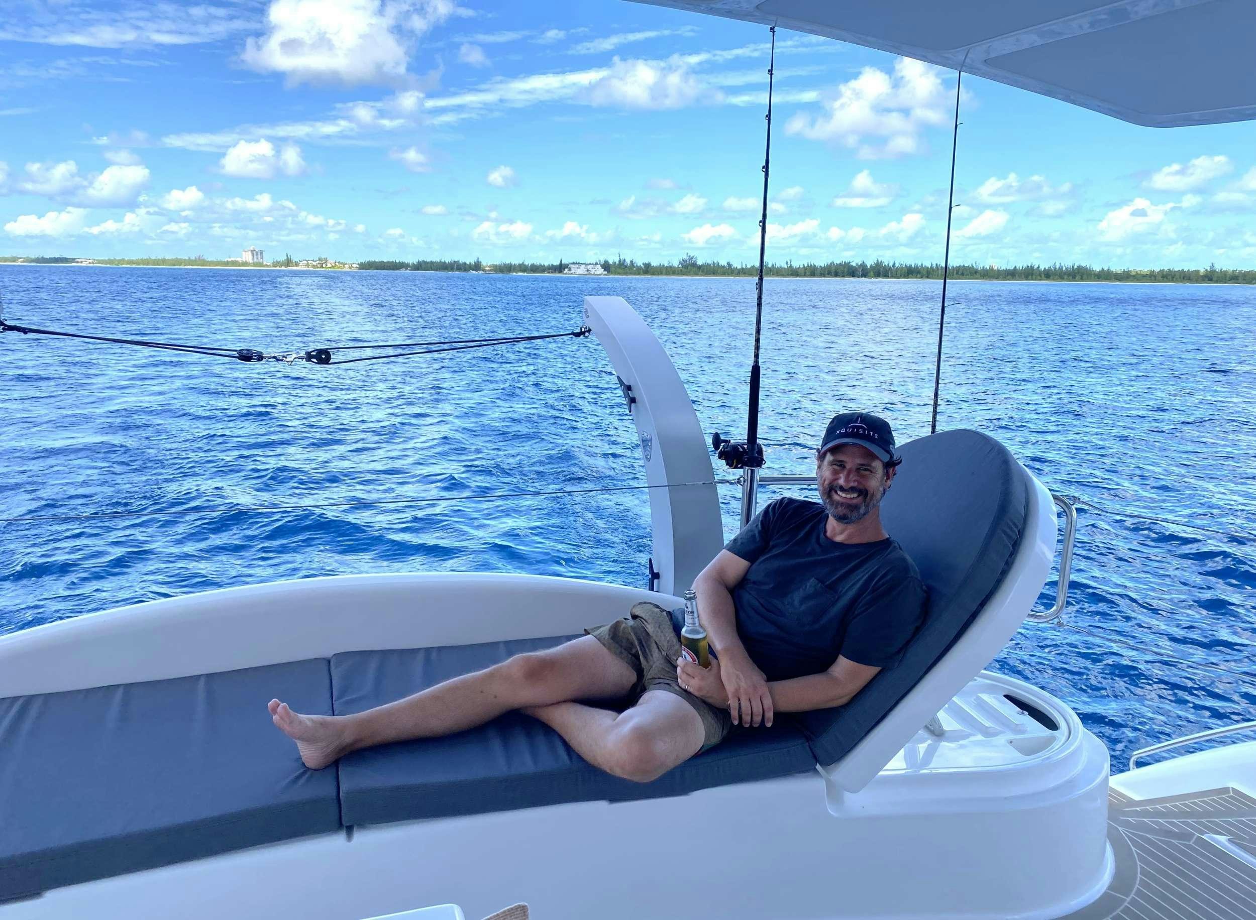 a person on a boat aboard WEIHAII Yacht for Charter