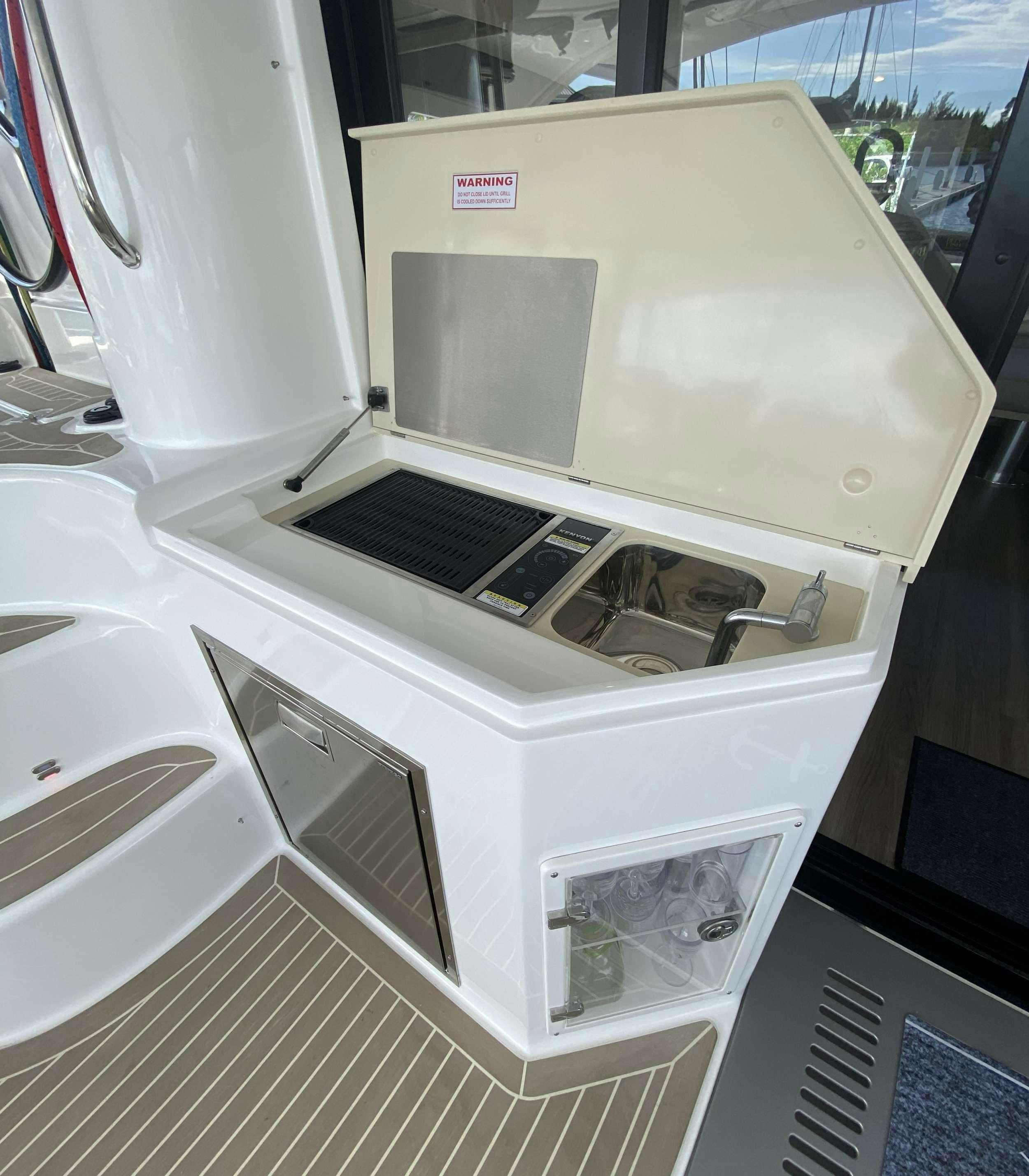 a white machine with a vent aboard WEIHAII Yacht for Charter