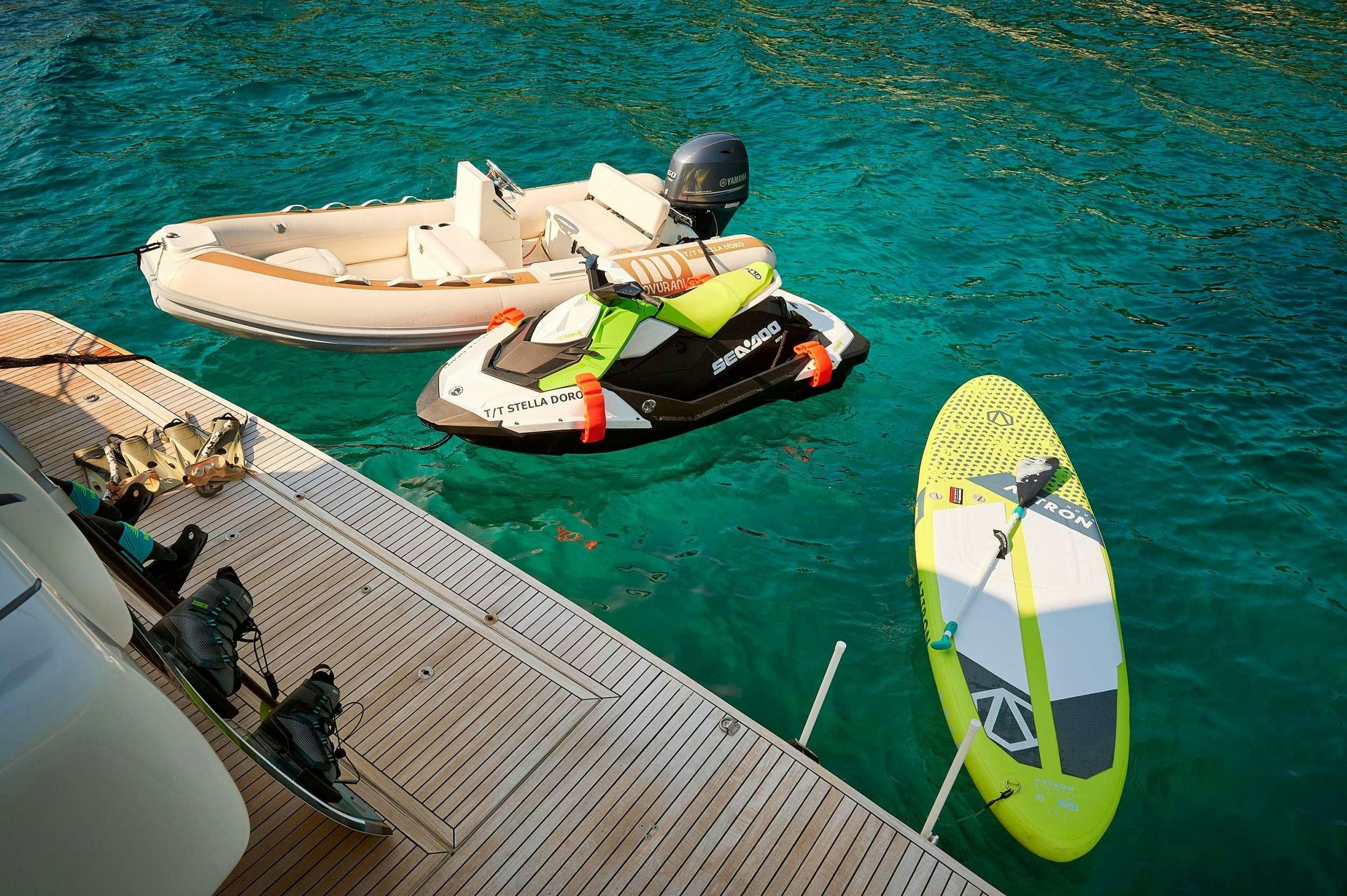 a group of boats on a dock aboard STELLA D'ORO Yacht for Charter