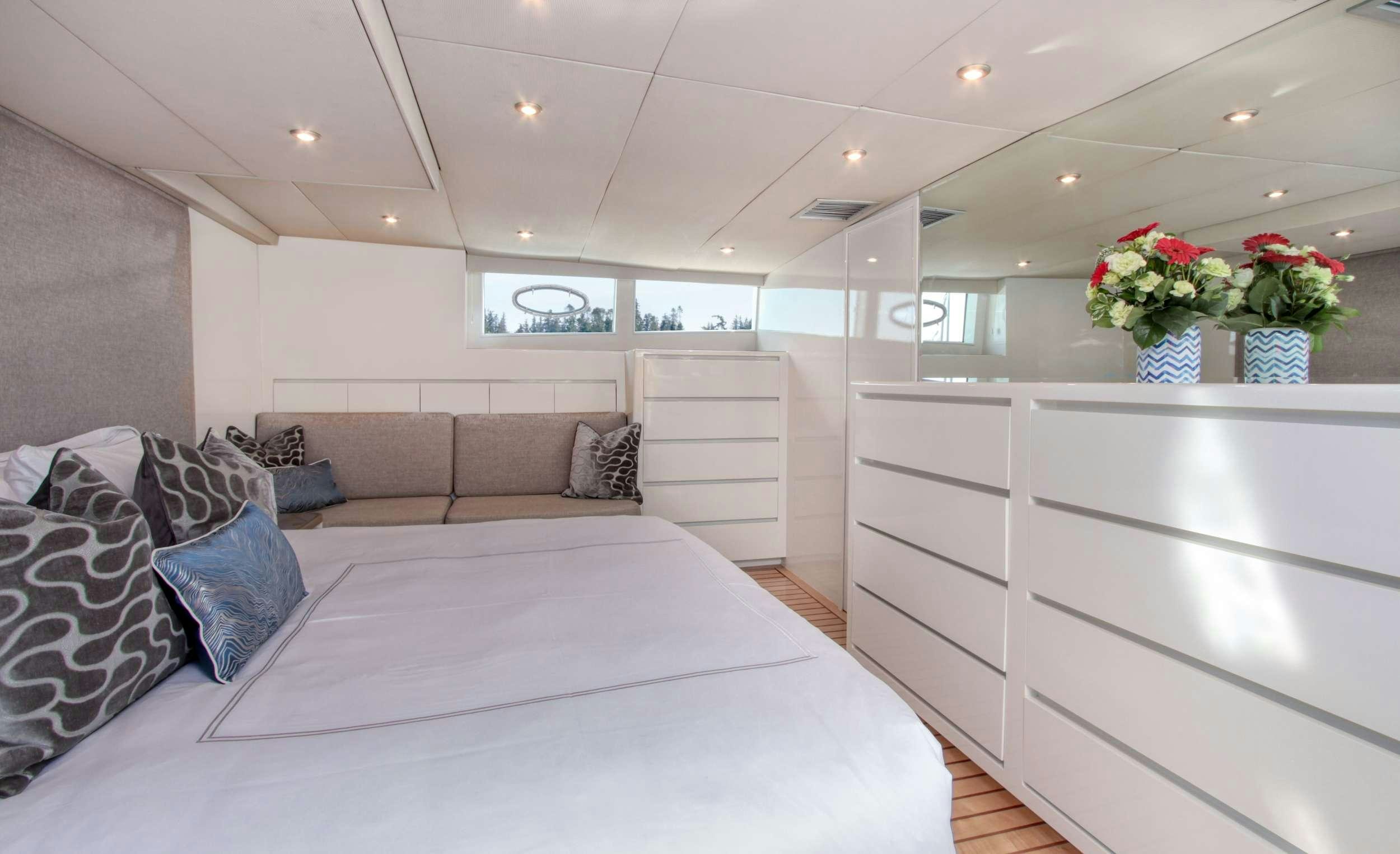 a bed in a room aboard FIRST HOME Yacht for Charter
