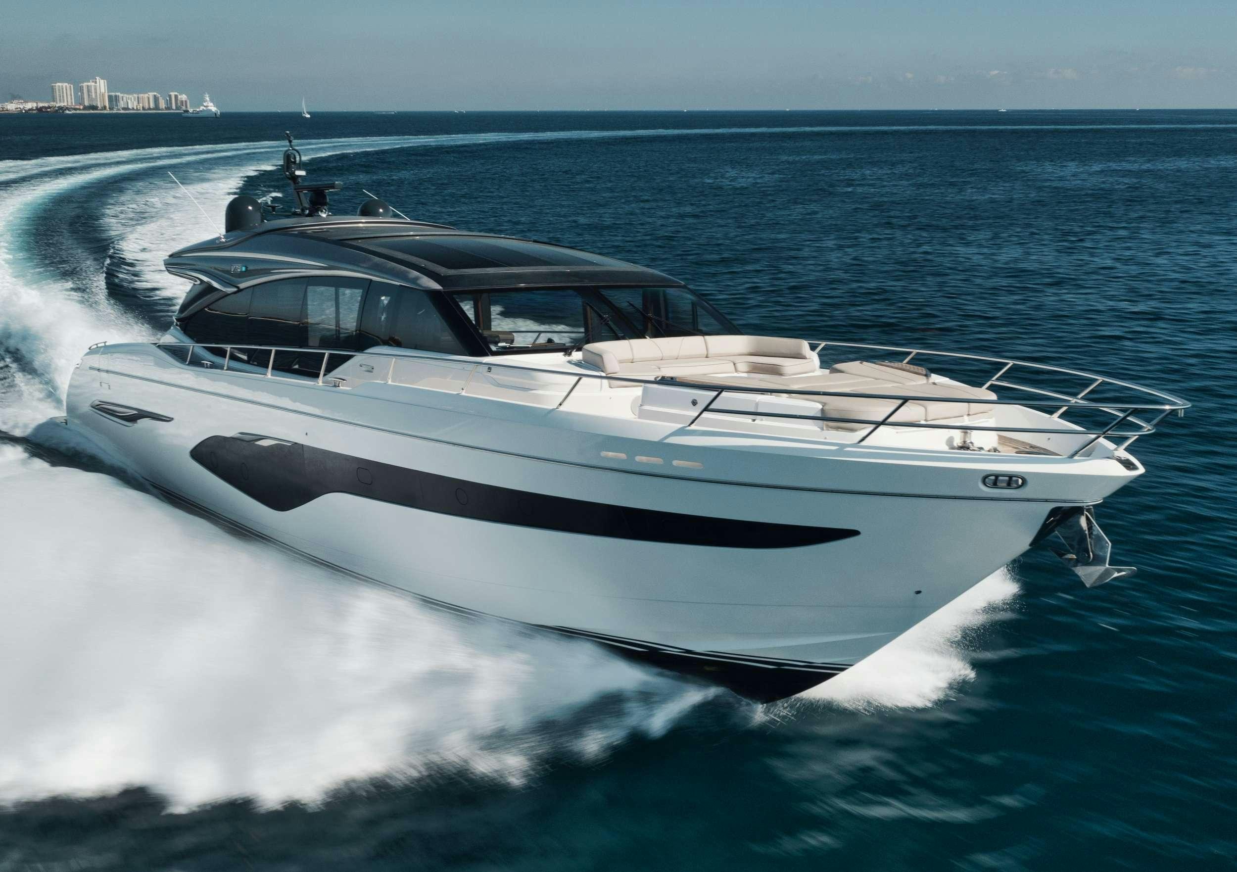 a white yacht on the water aboard HOOKED HER Yacht for Charter