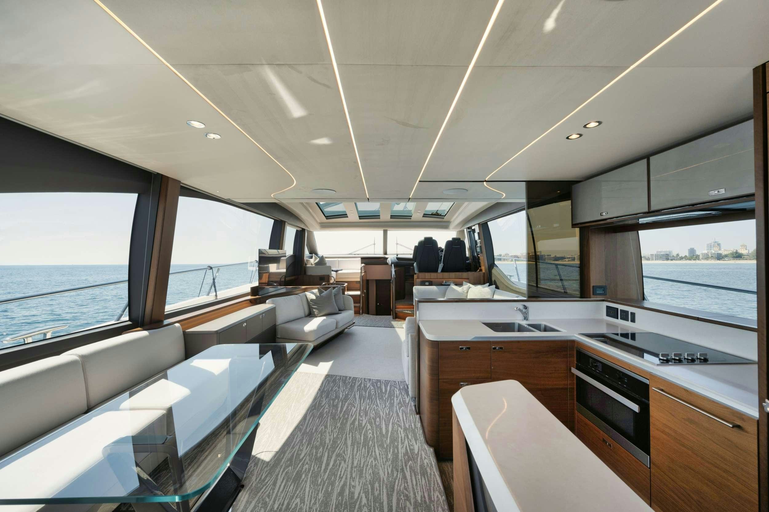 a large room with a large window aboard HOOKED HER Yacht for Charter