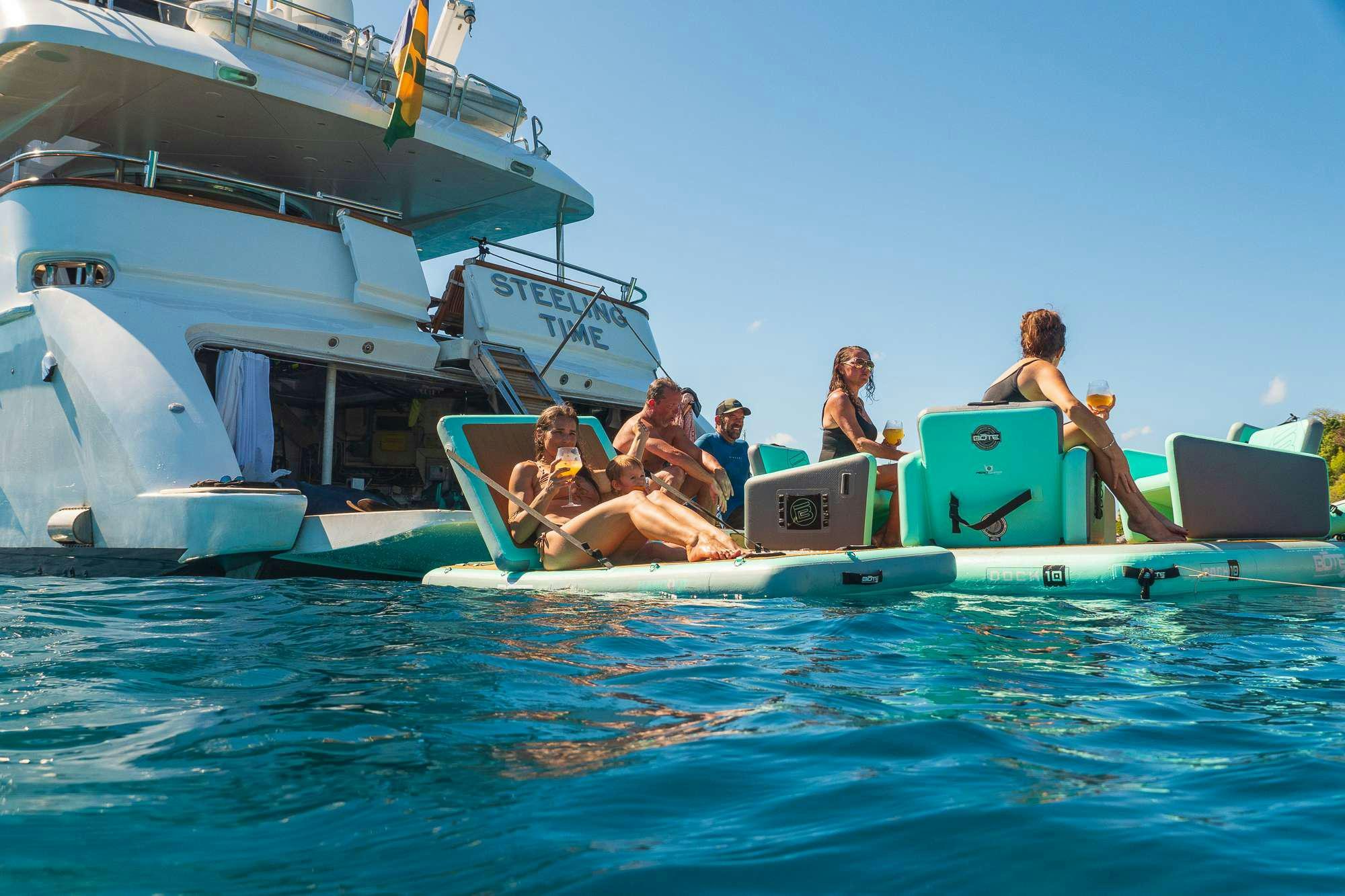 a group of people on a boat aboard STEELING TIME Yacht for Charter