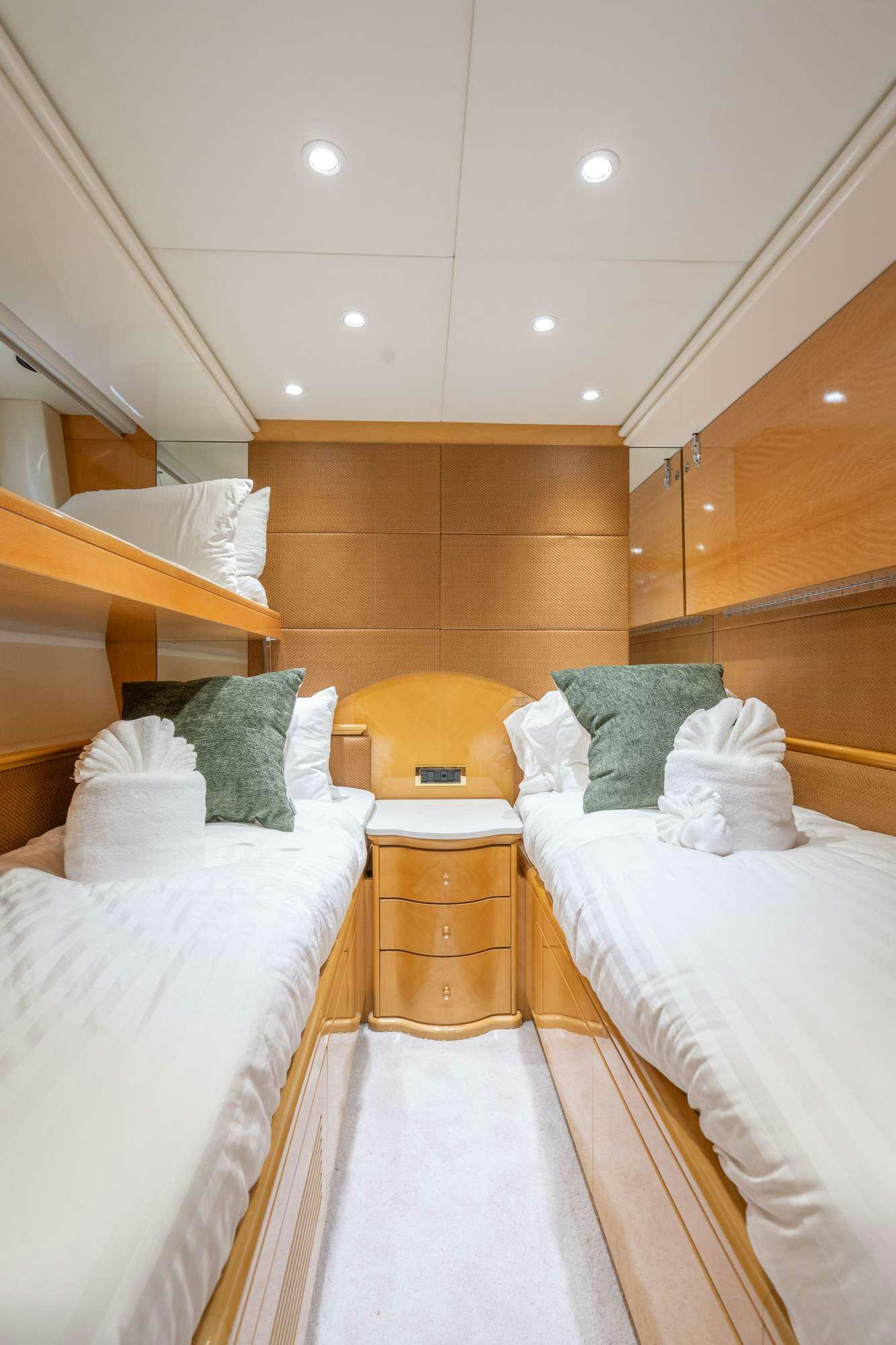 a couple of beds in a room aboard STEELING TIME Yacht for Charter