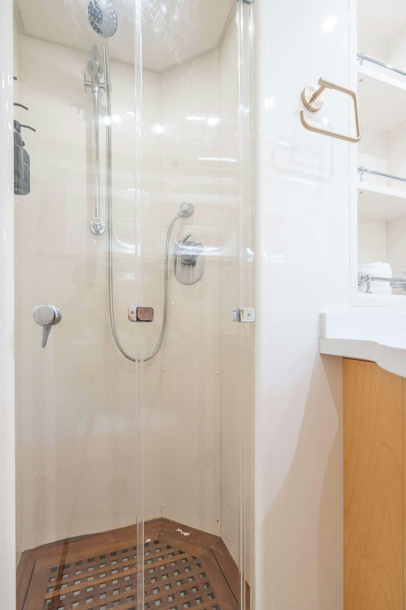 a shower with a shower head aboard STEELING TIME Yacht for Charter
