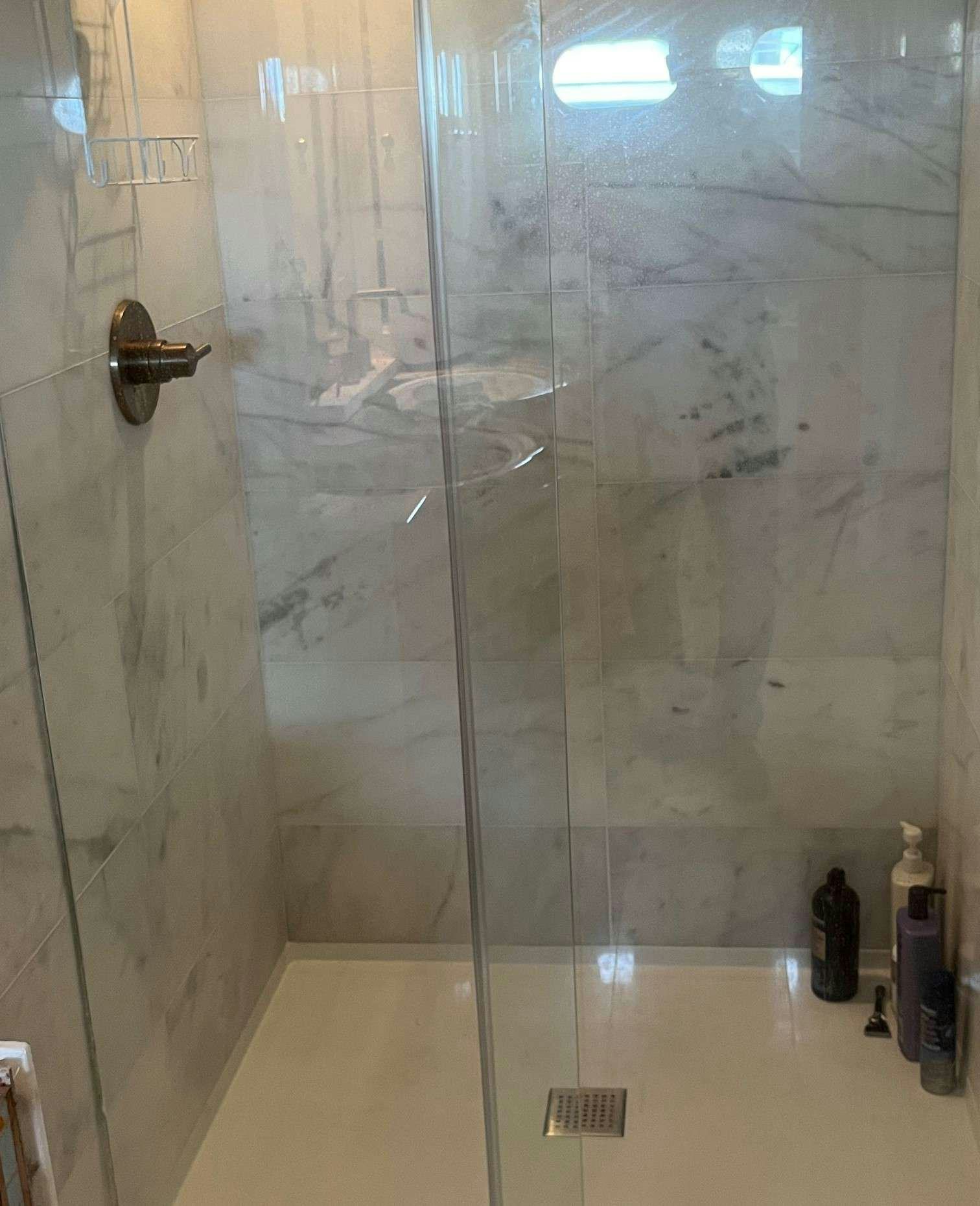 a shower with a glass door aboard STEELING TIME Yacht for Charter