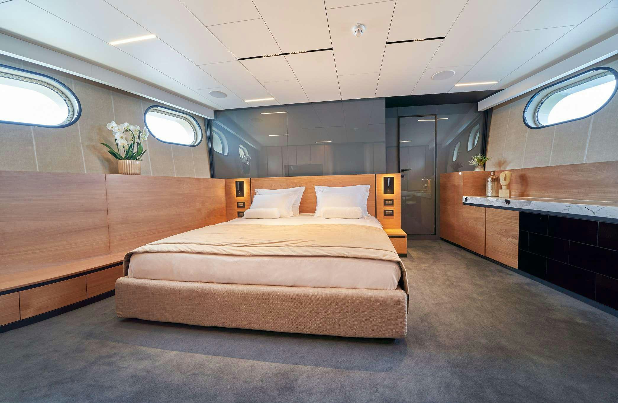 a bed in a room aboard MARALLURE Yacht for Charter