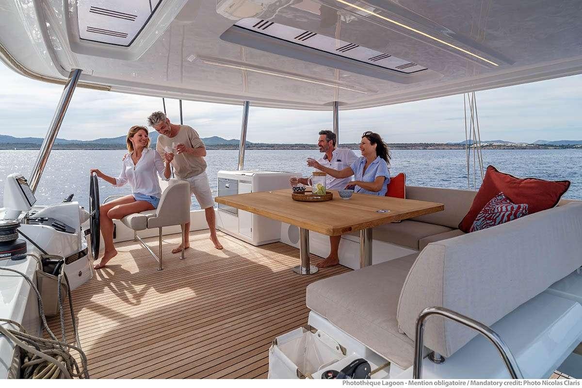 a group of people on a boat aboard VALINOR Yacht for Charter