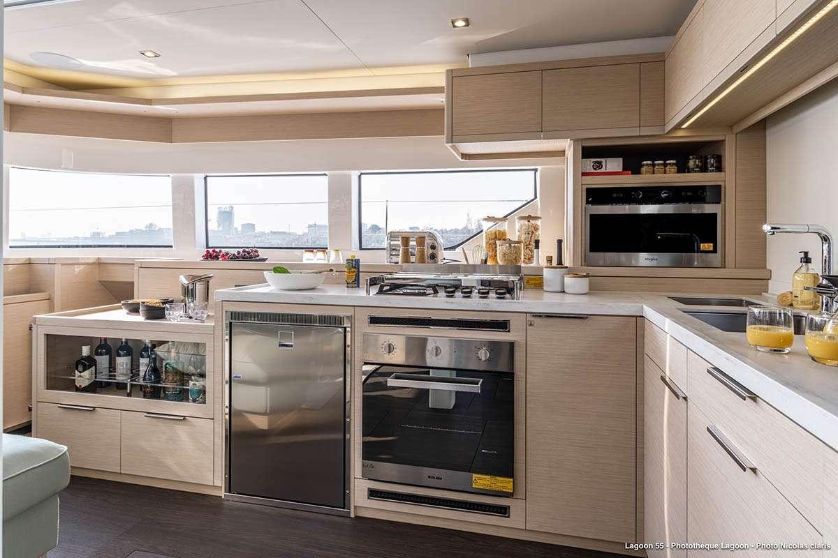 a kitchen with stainless steel appliances aboard VALINOR Yacht for Charter