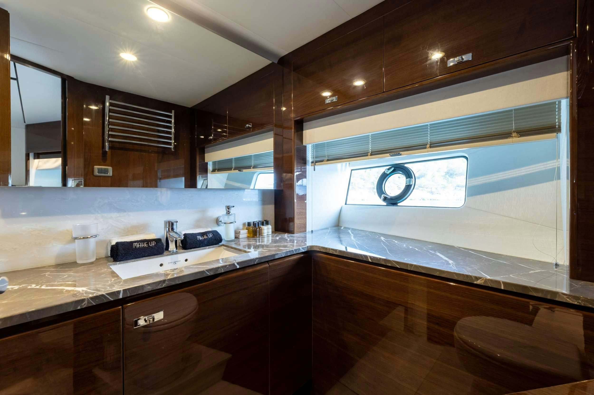 a kitchen with a large counter aboard VISTA Yacht for Charter