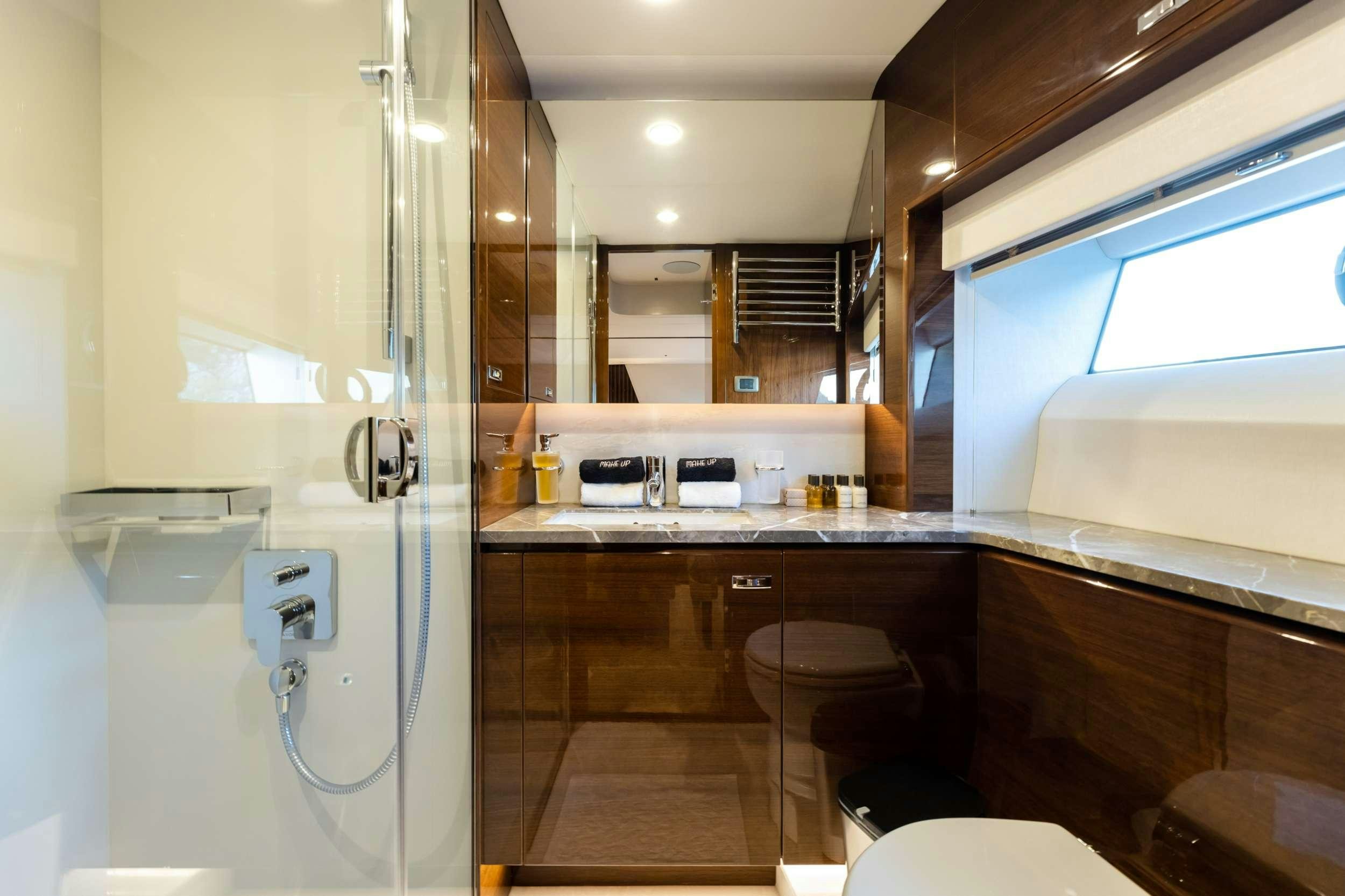 a kitchen with a sink and a window aboard VISTA Yacht for Charter