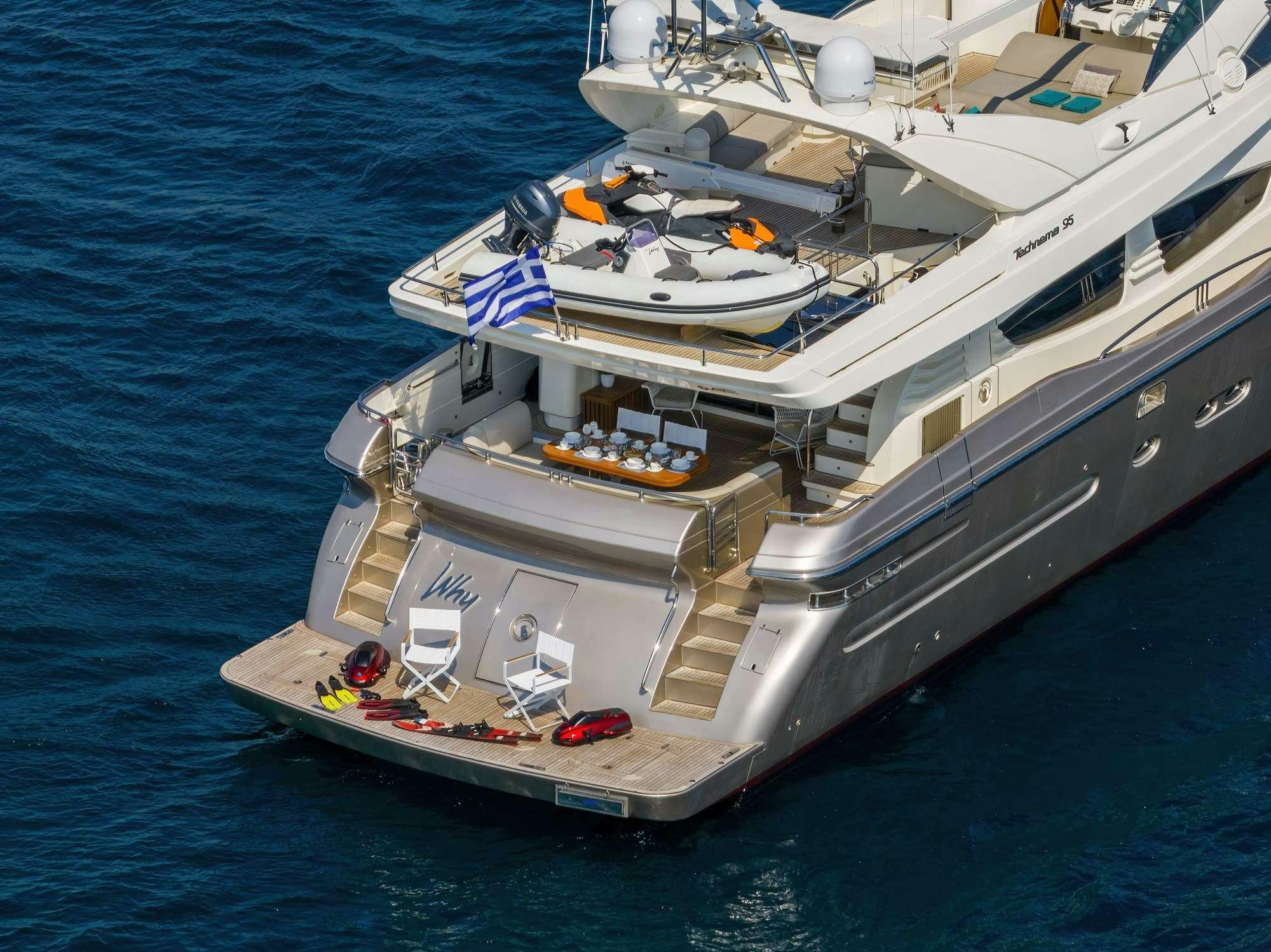 a large ship in the water aboard WHY Yacht for Charter