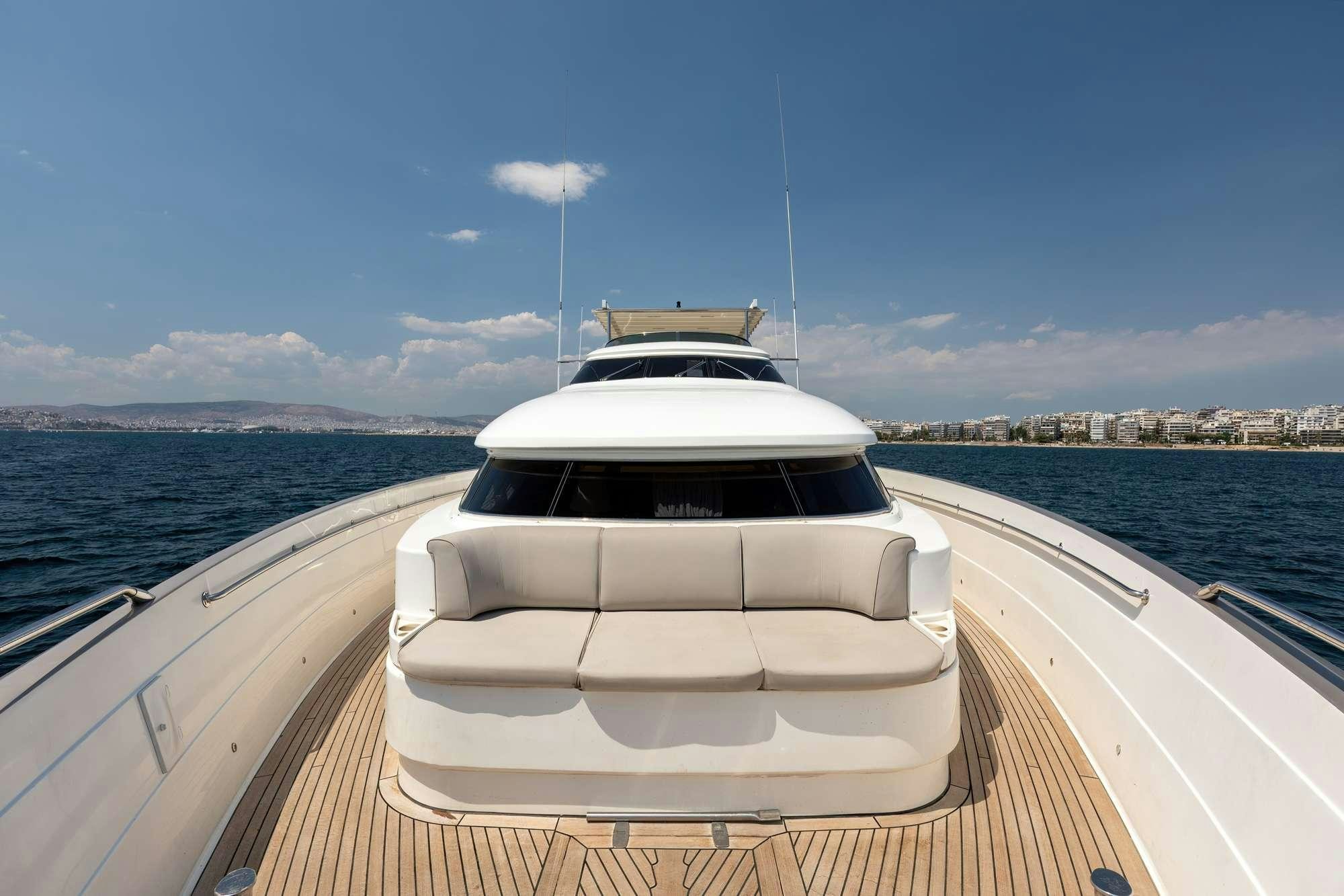 a boat on a dock aboard WHY Yacht for Charter