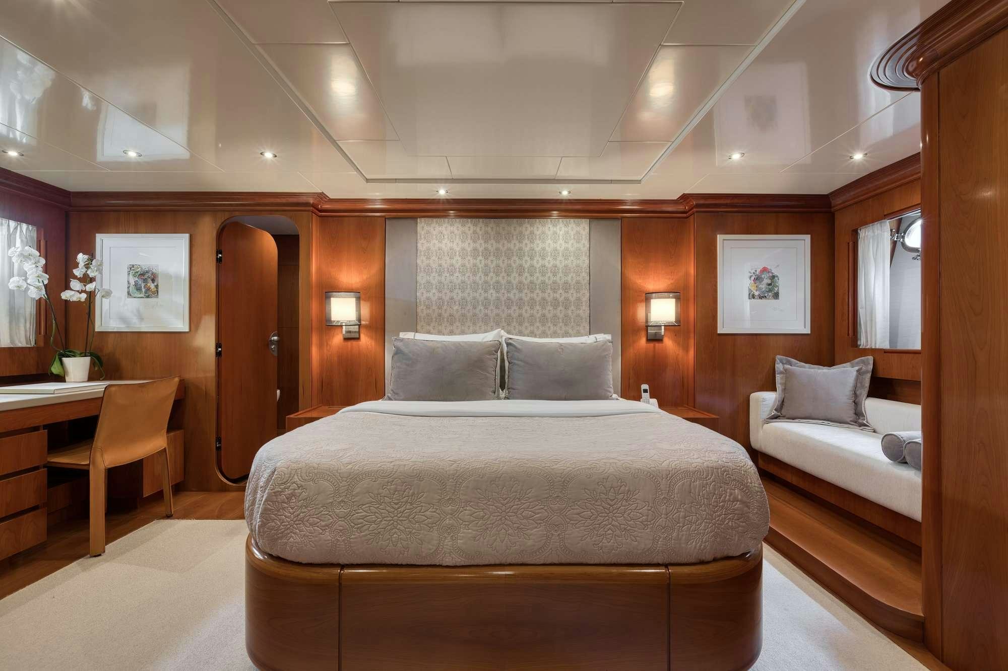 a bed in a room aboard WHY Yacht for Charter