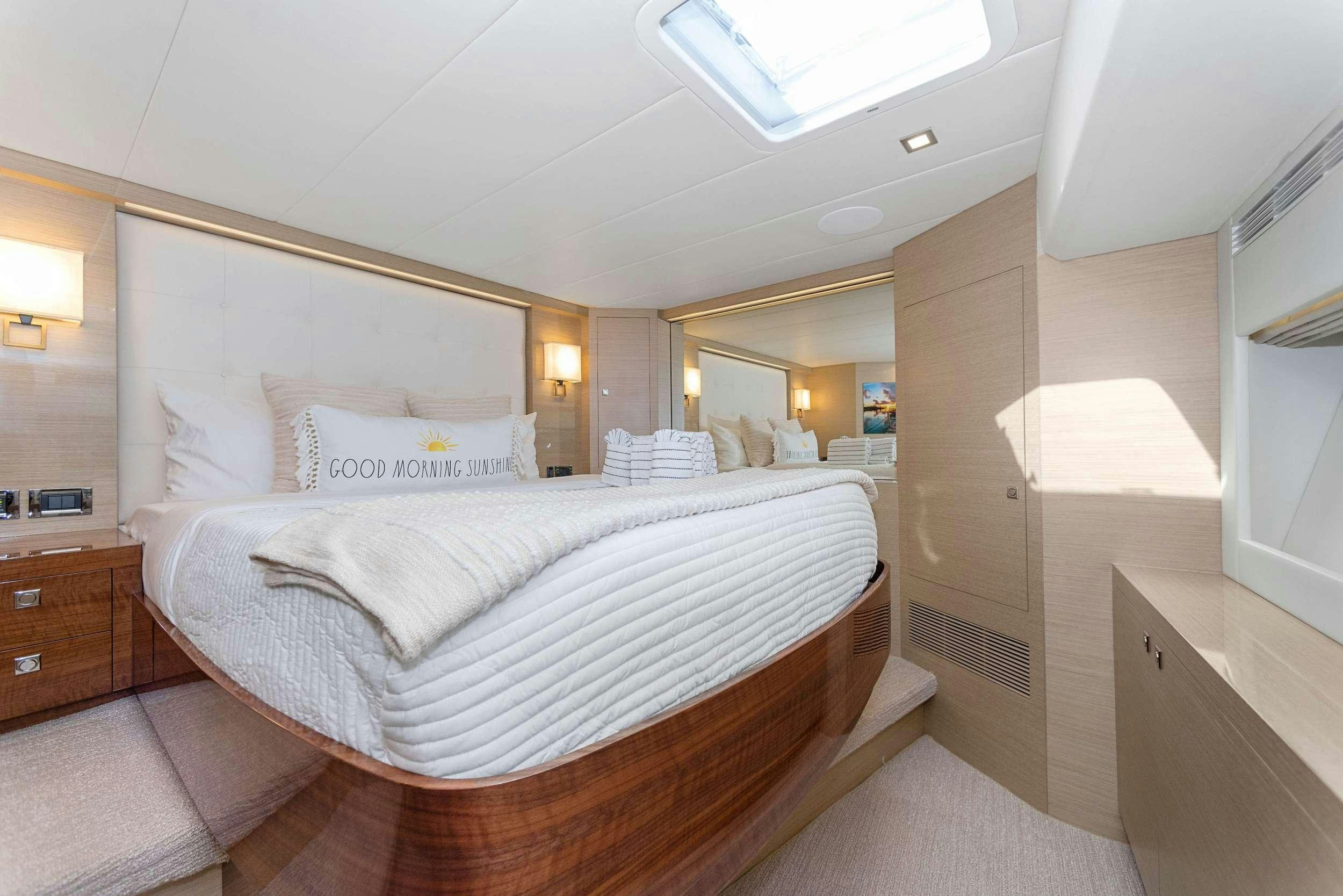 a bed in a room aboard SALUS Yacht for Charter